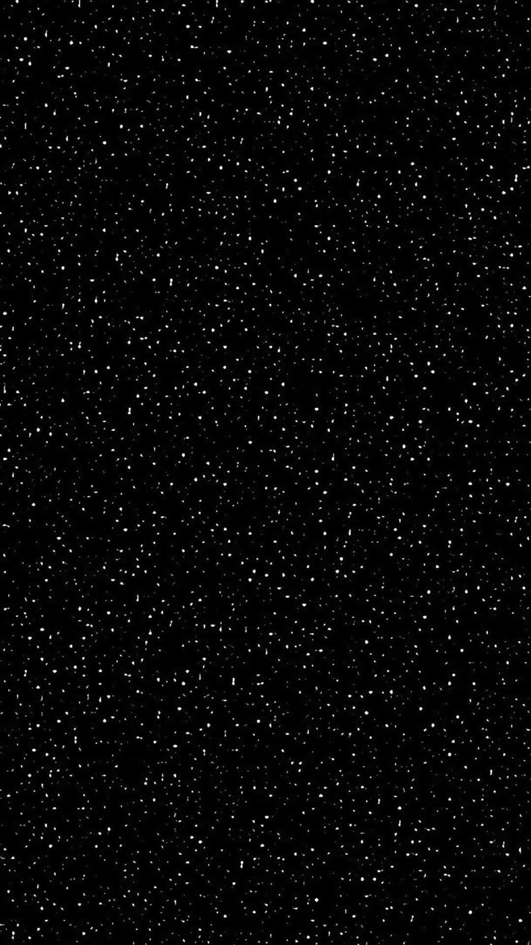 Dark Sky 桌布 壁紙 — 一塊廣闊的黑色畫布，點綴著無數細小的白色斑點，宛如深空中的遙遠星辰。