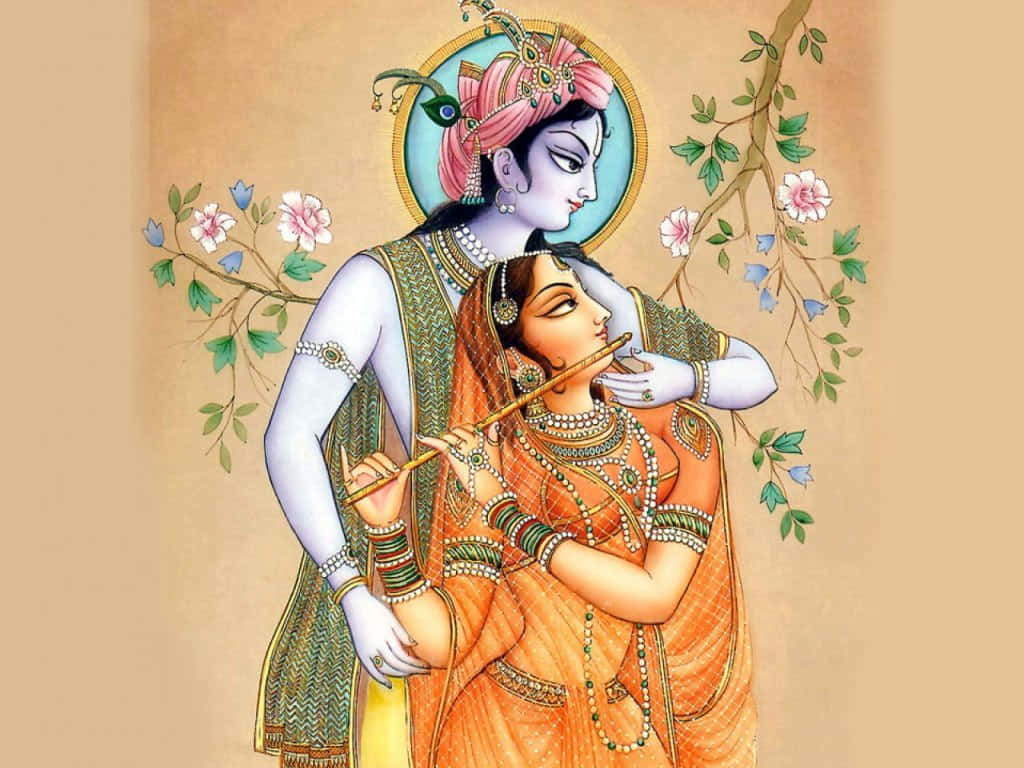 Radha Krishna 桌布 壁紙 — 一對神聖的夫婦穿著華麗的傳統服飾，在柔和的金色光芒下，於花枝間擁抱。