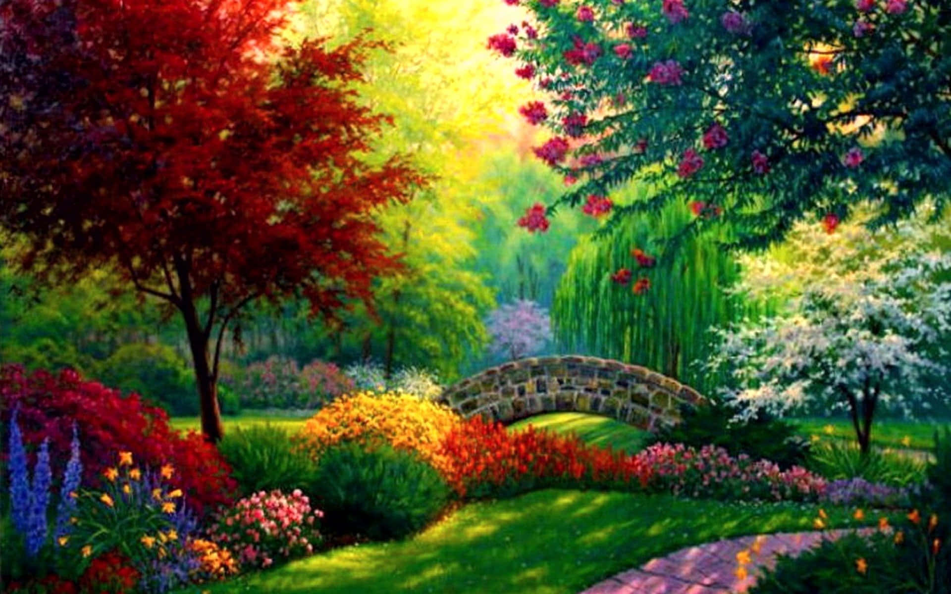 Picturesque 桌布 壁紙 — 一幅充滿活力的油畫，描繪陽光普照的花園，石橋拱跨溪流，四周環繞著色彩繽紛的花卉灌木和樹木。