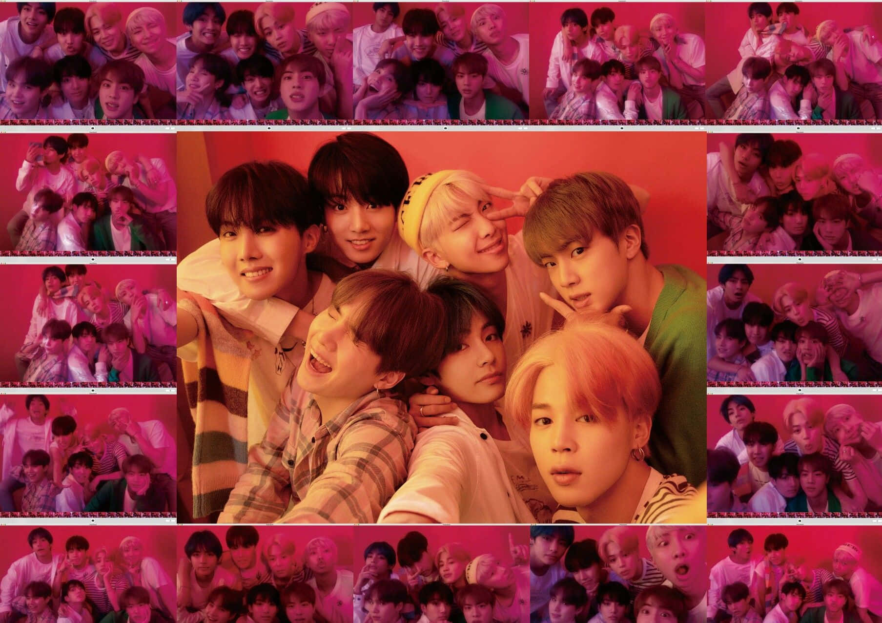 Big Hit Entertainment 桌布 壁紙 — 一幅充滿活力的粉紅色調拼貼畫，展示一個K-pop組合緊密地擺出俏皮表情。