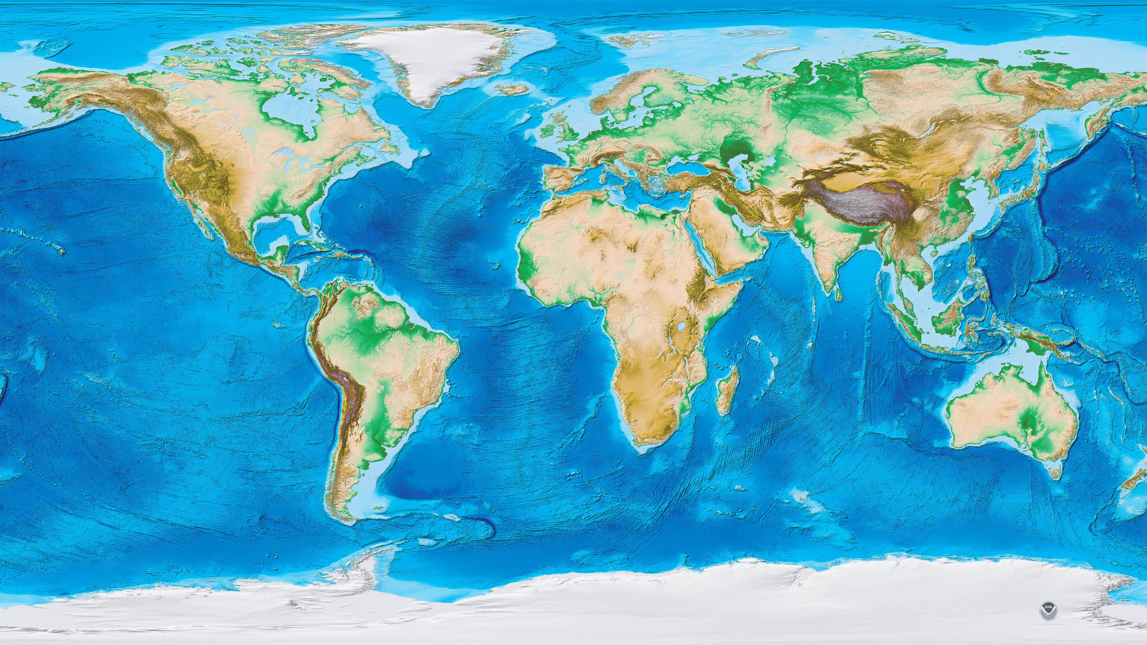 世界地圖 桌布 壁紙 — 一幅充滿活力的紋理世界地圖，以大地色調顯示大陸，深藍色顯示海洋，並有極地冰蓋。