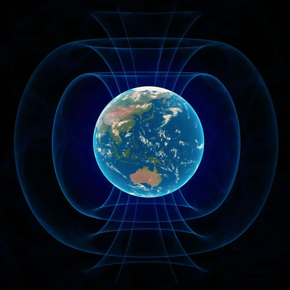 Magnetic Field 桌布 壁紙 — 一幅生動描繪地球被發光藍色磁場線包圍，背景為黑色虛空的圖像。