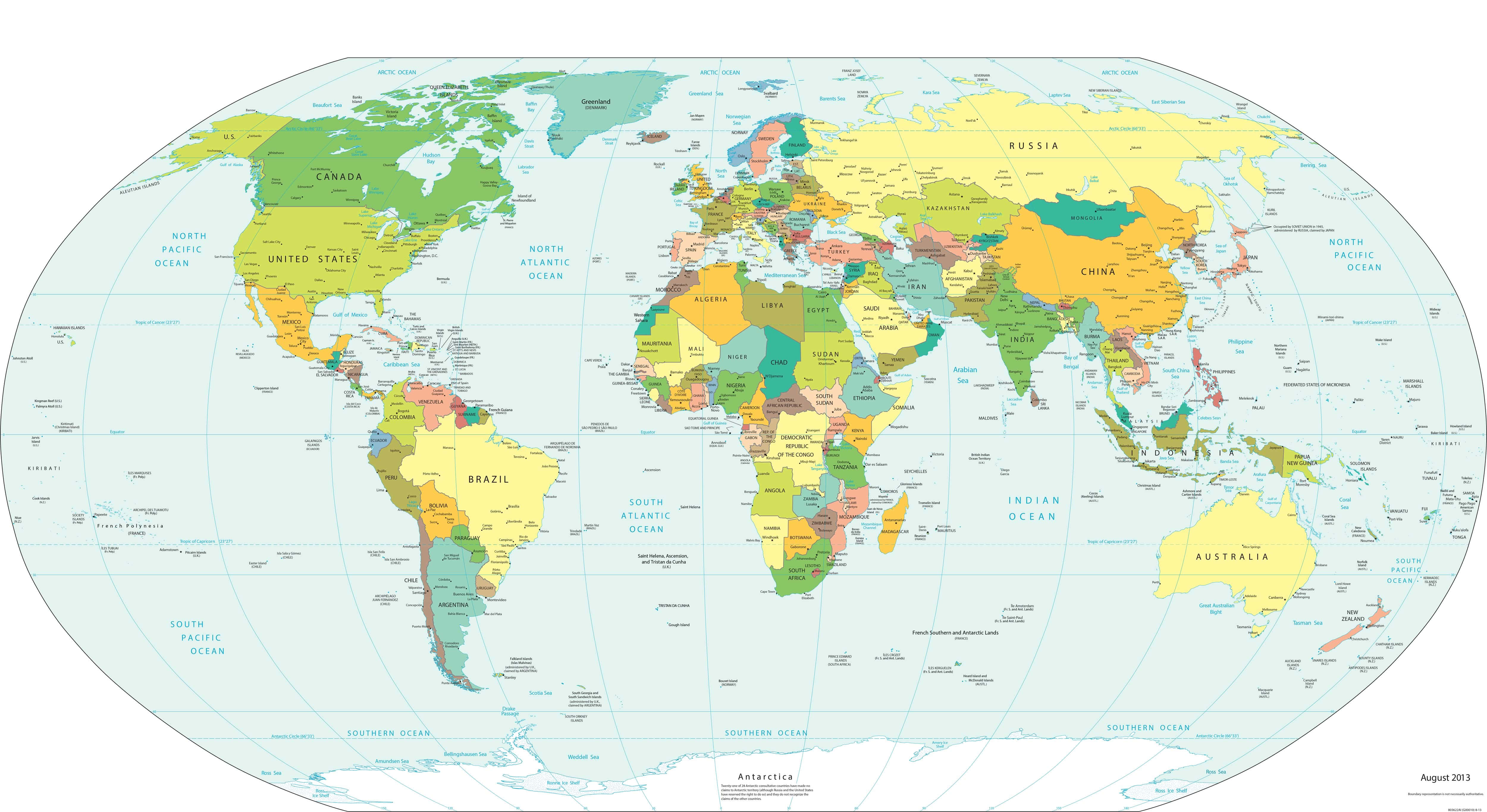 World 桌布 壁紙 — 一幅色彩繽紛的政治世界地圖，各國以不同色調呈現，海洋標有標籤，背景為淺藍色。