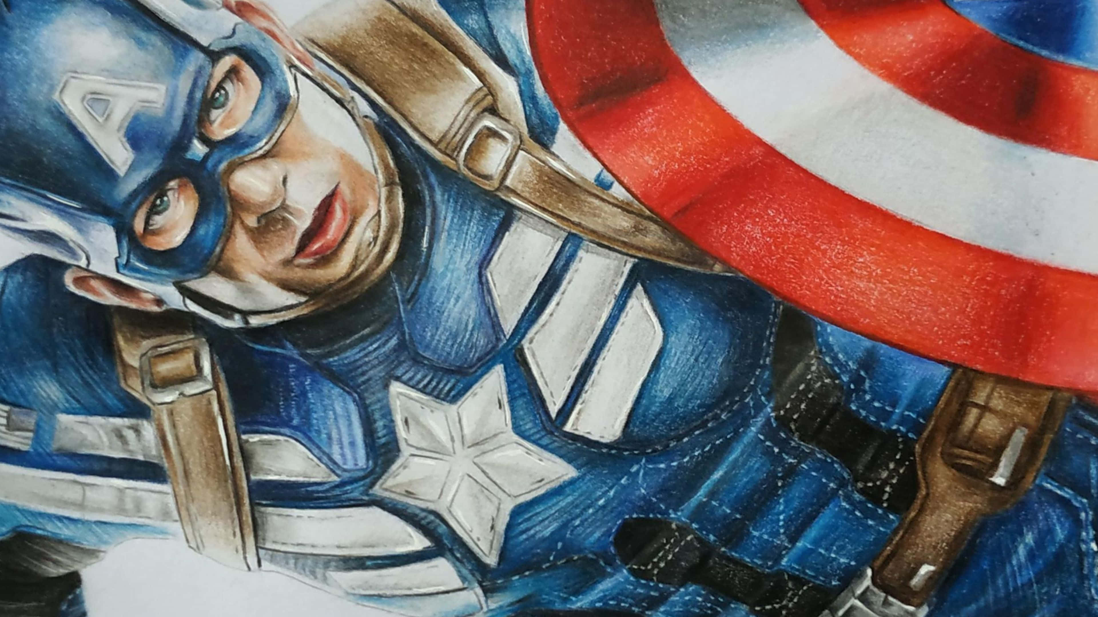 4K Captain America 桌布 壁紙 — 一幅詳細的彩色鉛筆畫，描繪美國隊長穿著標誌性藍色戰衣，帶有星形標誌和盾牌。