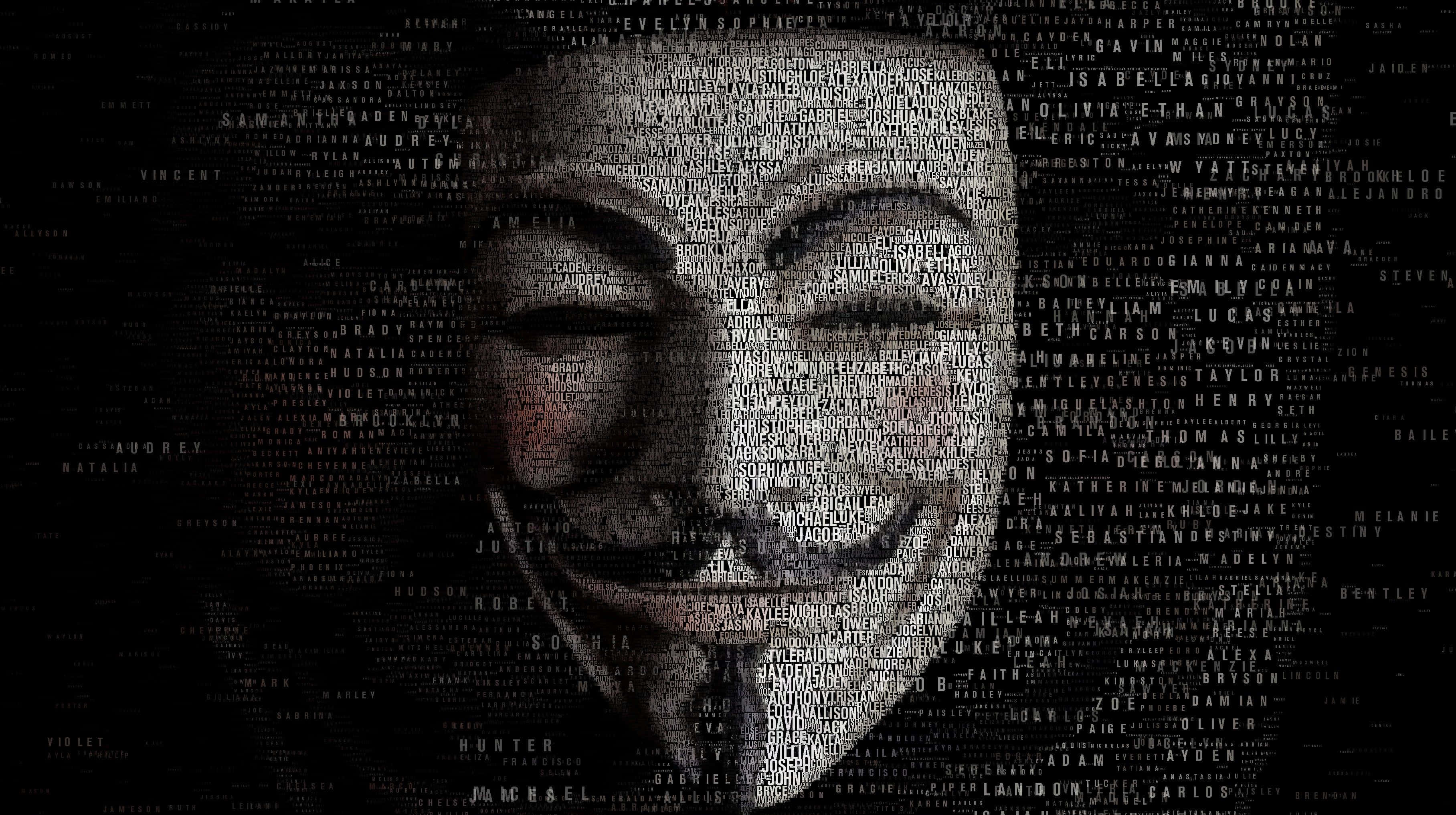 Anonymous 桌布 壁紙 — 一幅黑白肖像，人物戴著由重疊白色名字組成的蓋伊·福克斯面具，背景為黑色。