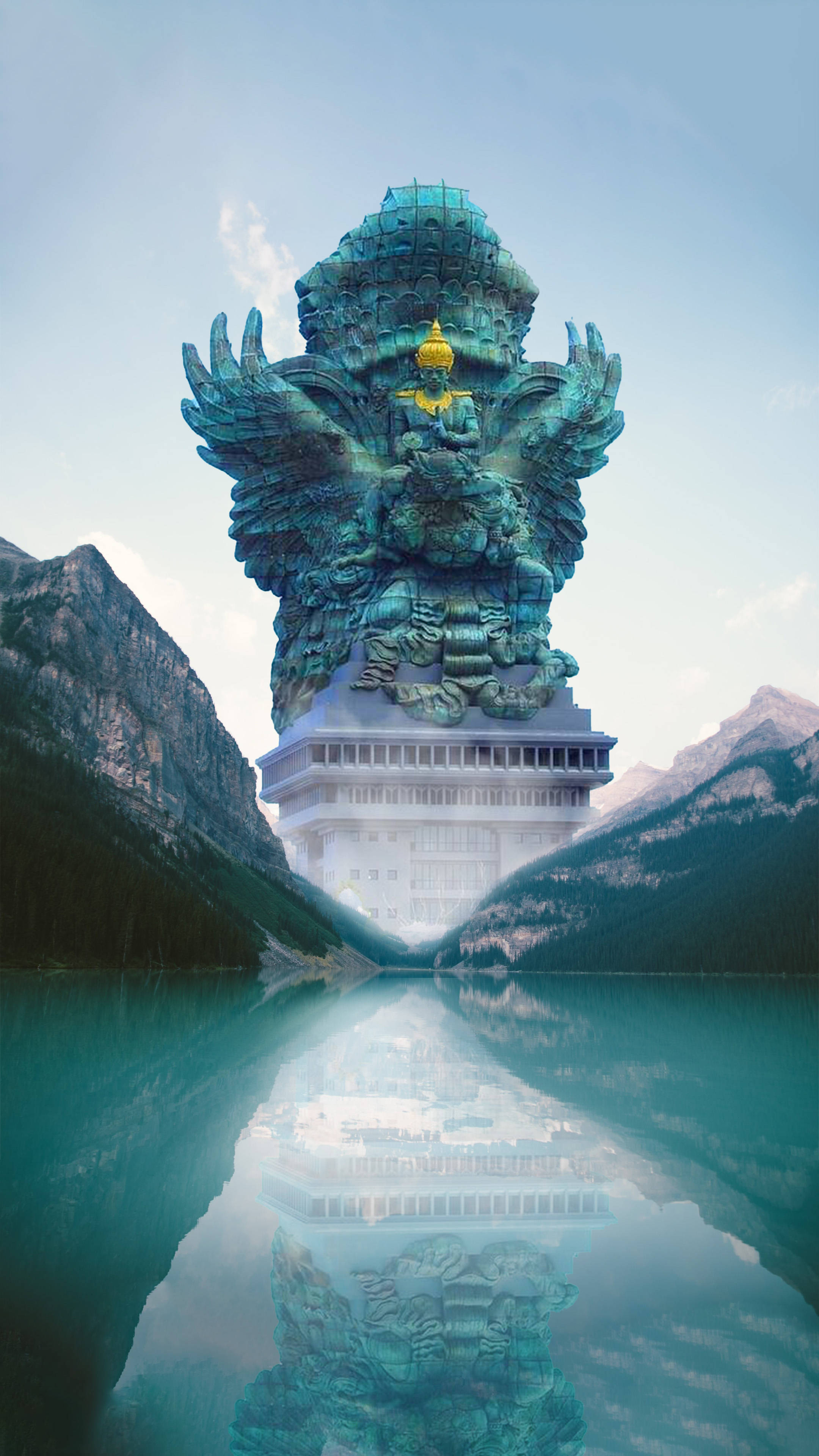Hindu Temple 桌布 壁紙 — 一座巨大的綠松石色有翼神像從山湖中升起，在晴朗的天空下完美倒映。