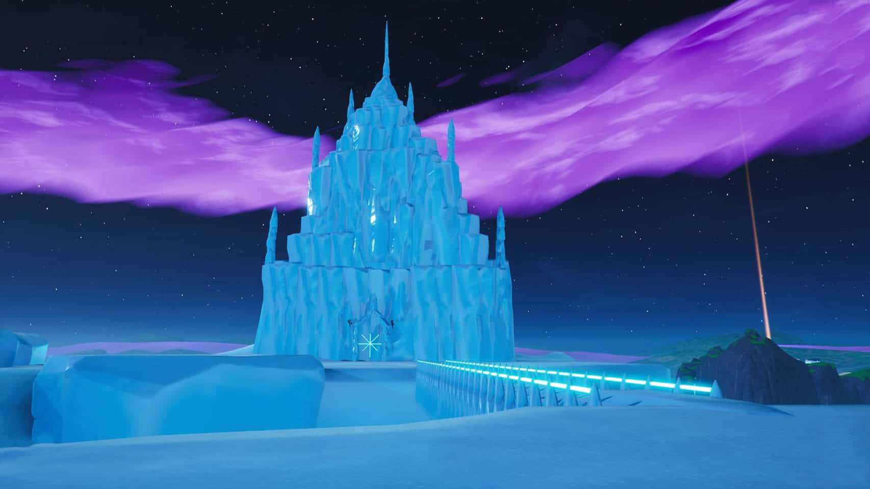 冰雪城堡 桌布 壁紙 — 一座發光的藍色冰城堡矗立在星空下，伴隨著鮮豔的紫色雲彩和一條通往入口的發光橋樑。