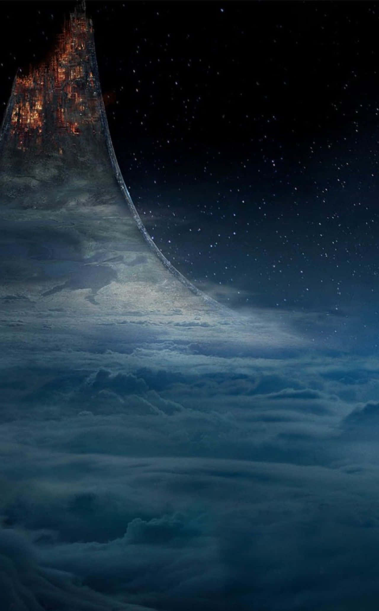 Halo Ring 桌布 壁紙 — 一座高聳的懸崖城市在無盡藍雲之上的星空下溫暖地發光。