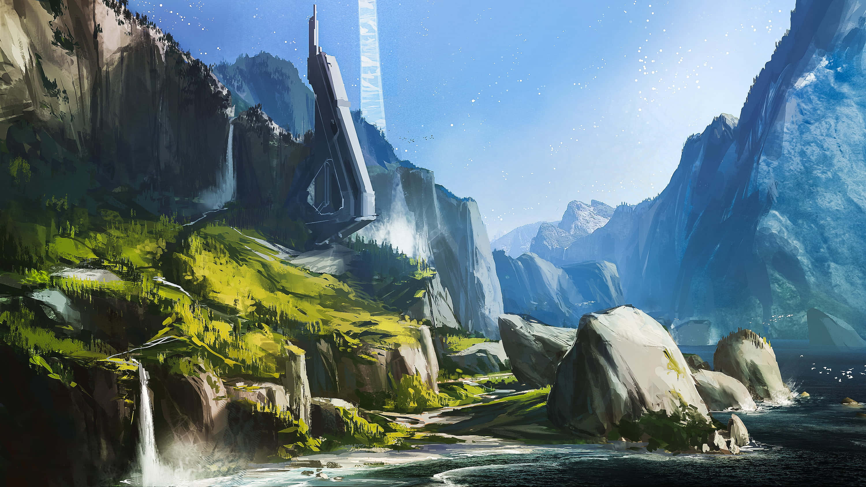 Halo Forerunner 桌布 壁紙 — 一座高聳的未來主義巨石從青翠的山谷中升起，兩側是鋸齒狀的山脈，上方是明亮的藍天，飄落著粒子。