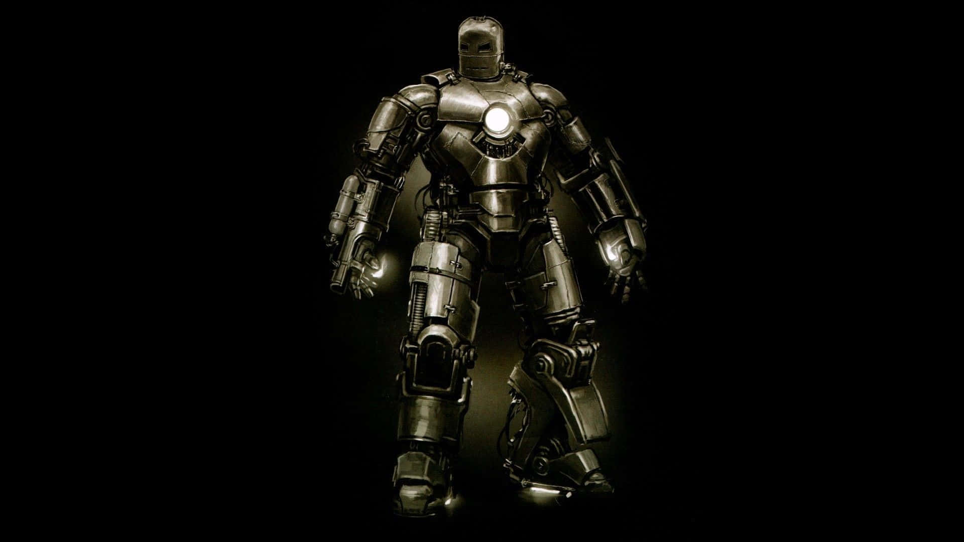 Iron Man Suit 桌布 壁紙 — 一座高聳的金屬裝甲服在漆黑虛空中被照亮，胸口和手部發出光芒。