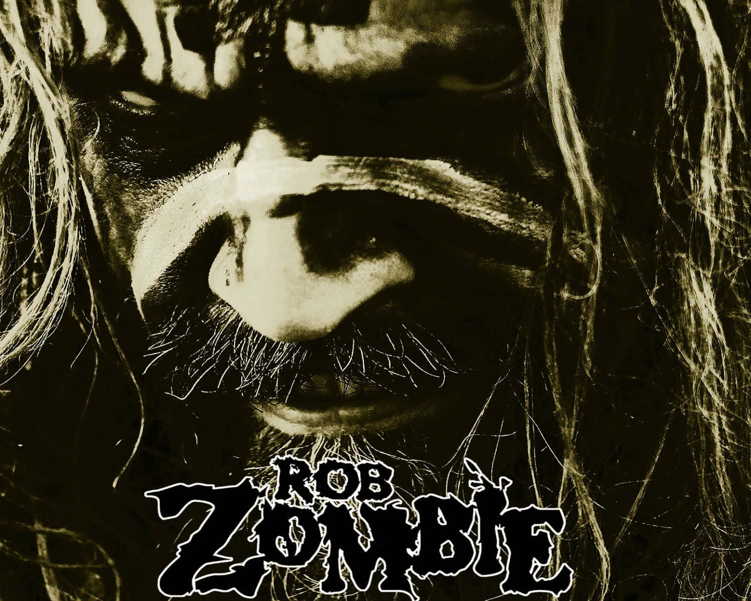Rob Zombie 嘅強烈近距離肖像，長頭髮同哥德式化妝。