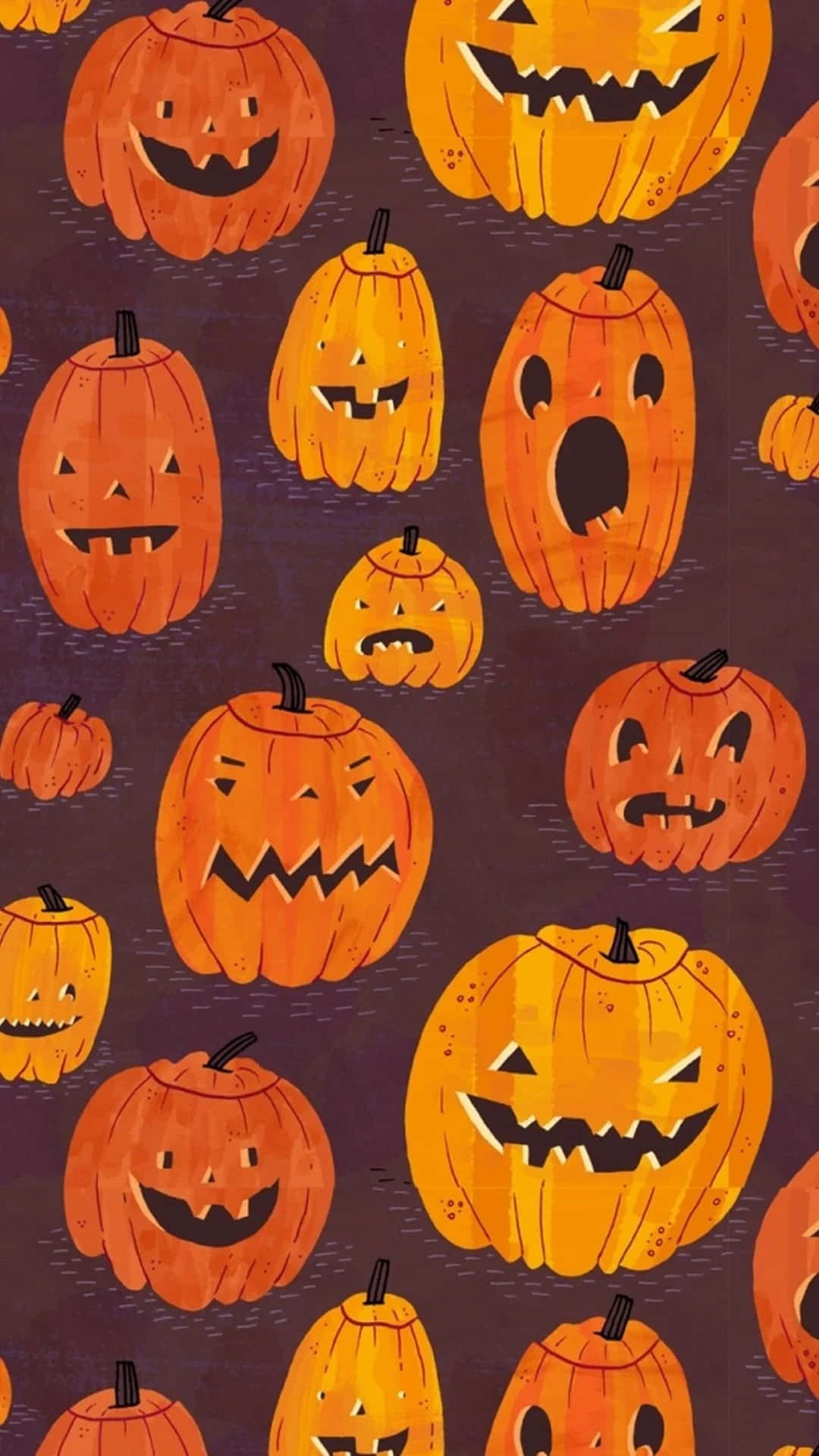 Halloween Phone 桌布 壁紙 — 一張充滿活力的萬聖節桌布，以卡通風格的南瓜燈為特色，在深紫色背景上展現各種詭異表情。