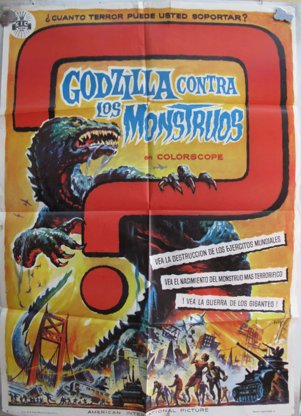 Godzilla Vs Mothra 桌布 壁紙 — 一張復古西班牙語哥斯拉電影海報，顯示怪獸在燃燒的城市中橫衝直撞，下方有坦克和驚恐的人們。