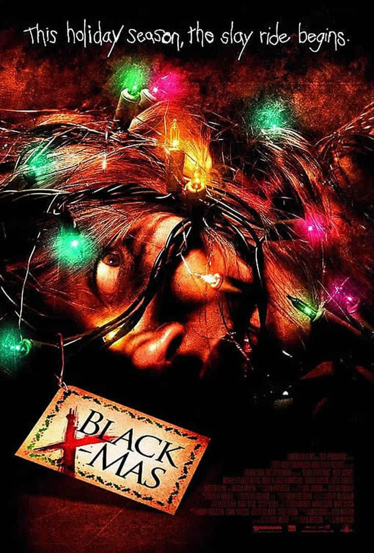 Christmas Movie 桌布 壁紙 — 一張恐怖電影海報顯示一個人的臉被發光的聖誕燈纏繞，並帶有「Black Mas」標籤。