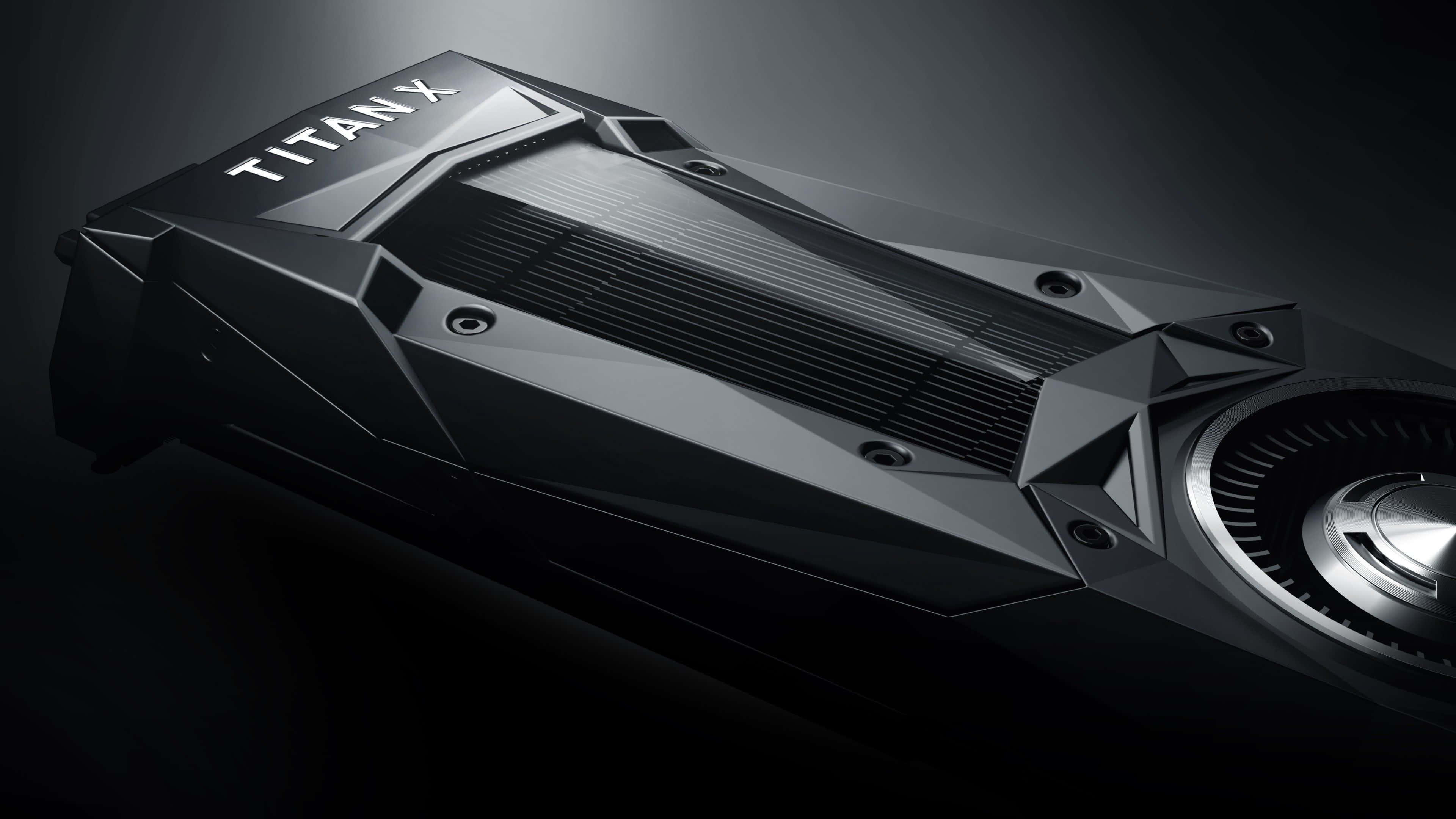 4K Graphics Cards 桌布 壁紙 — 一張時尚的黑色 Titan X 顯示卡，採用棱角設計和金屬飾邊，在戲劇性的工作室燈光下閃耀。