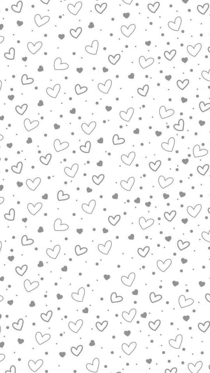 Cute Hearts 桌布 壁紙 — 一張極簡風格的牆紙，白色背景上散落著灰色輪廓的心形和圓點。