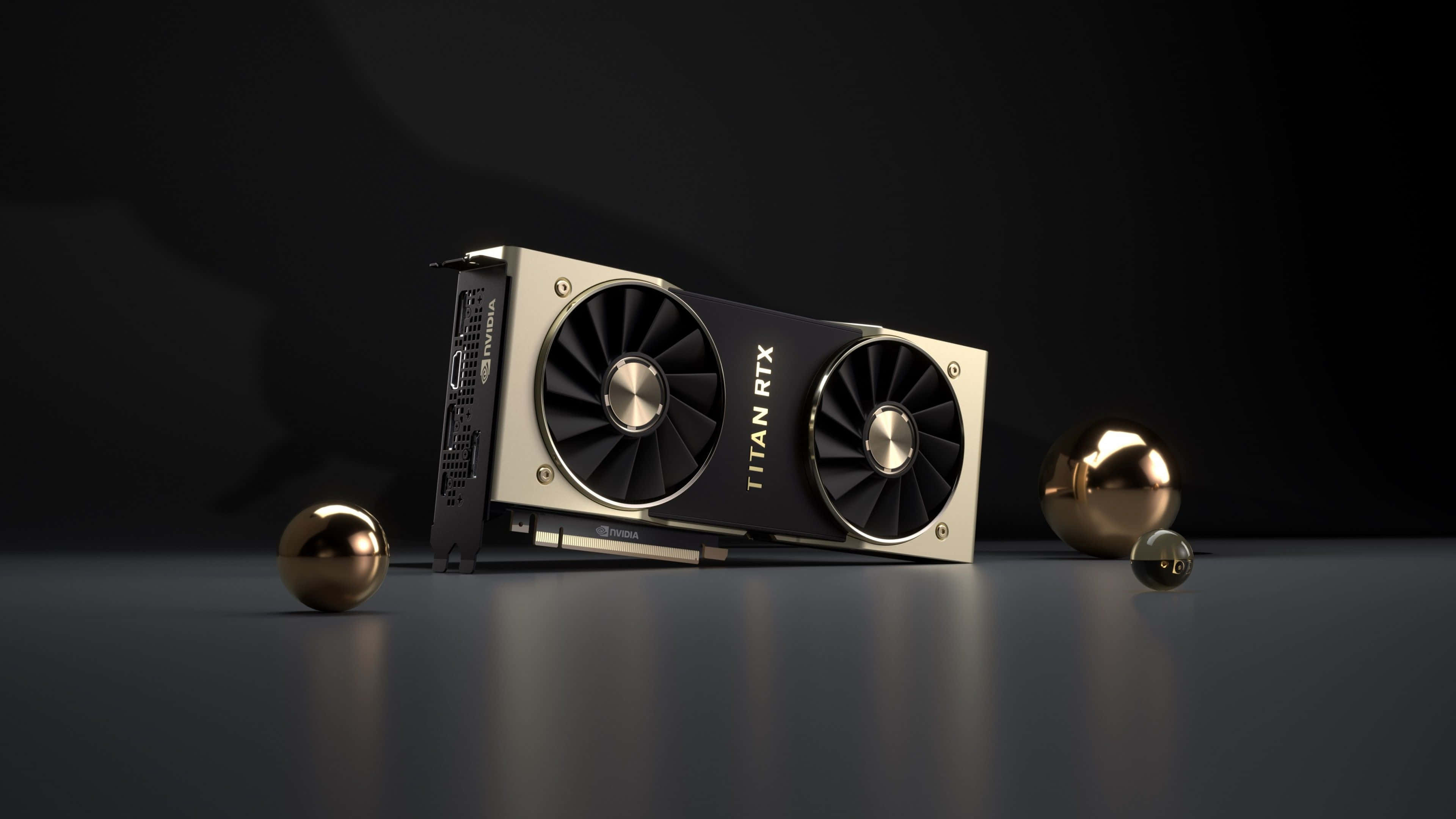4K Graphics Cards 桌布 壁紙 — 一張流線型的NVIDIA Titan RTX顯示卡以對角線方式放置在深色反光表面上，周圍環繞著拋光金球，在戲劇性的工作室燈光下。