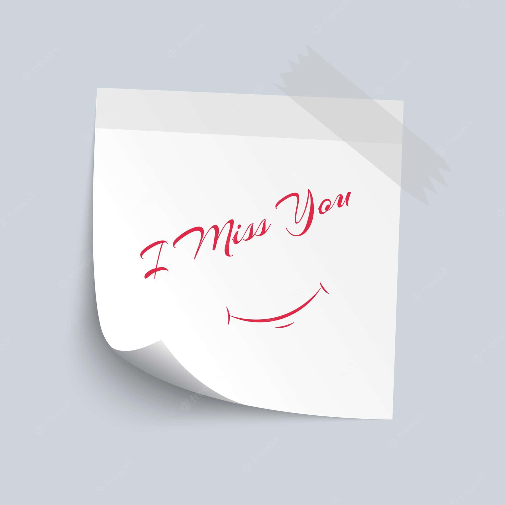 I Miss You 桌布 壁紙 — 一張白色便利貼，上面有紅色草書文字寫著「I Miss You」和一個笑臉，角落微微翹起，背景是淺灰色。
