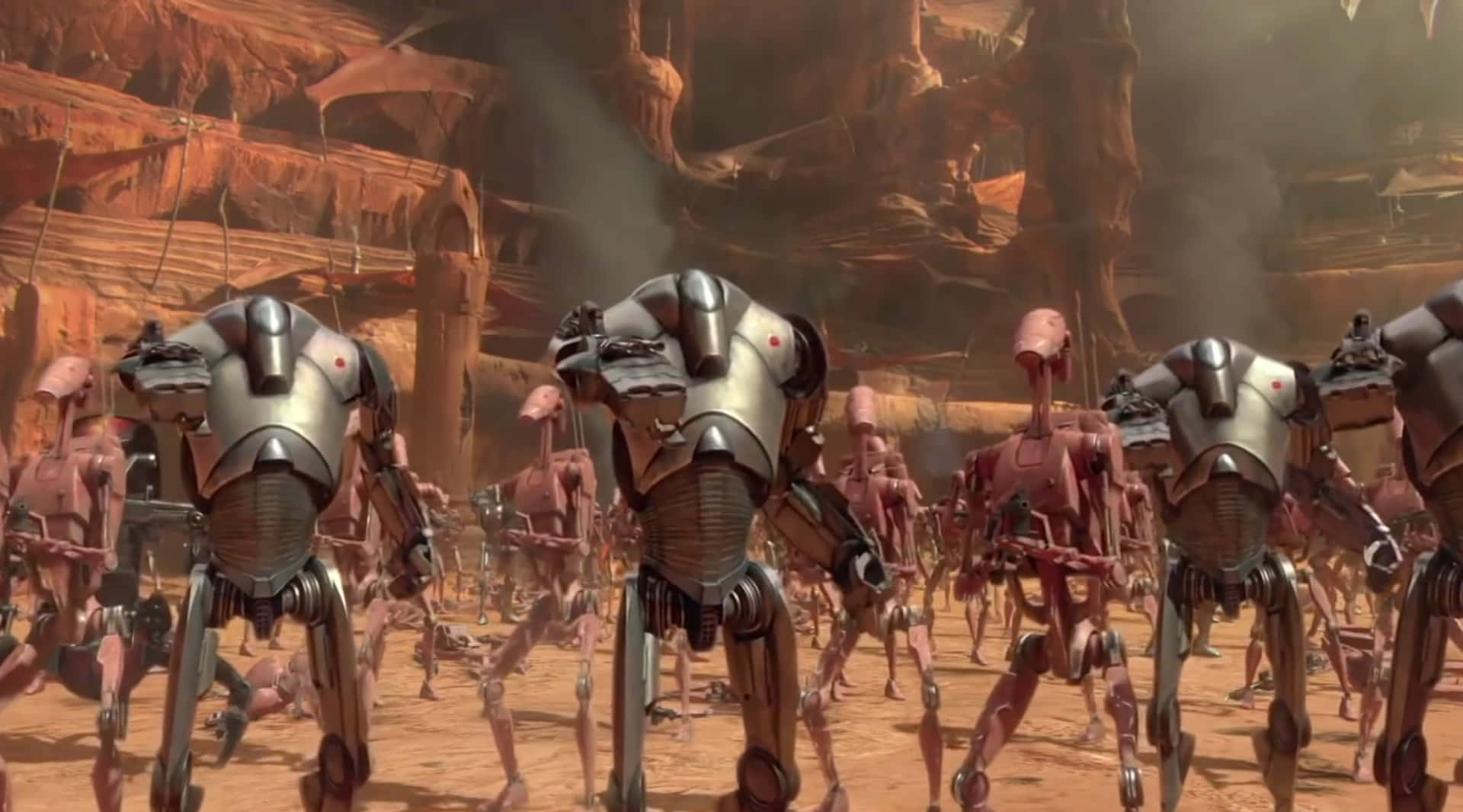 The Battle Of Geonosis 桌布 壁紙 — 一支戰鬥機械人部隊在朦朧的天空下，穿越沙漠星球上佈滿灰塵的峽谷。