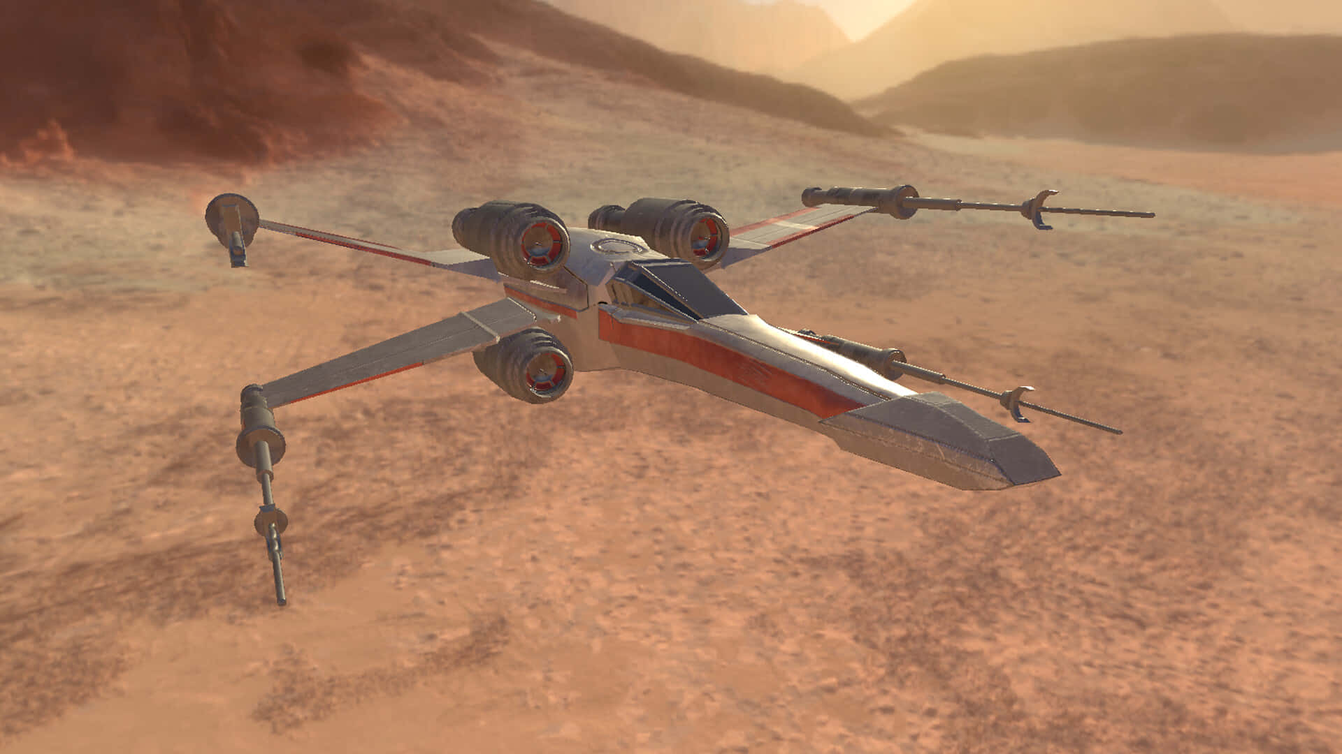 The Z-95 Headhunter 桌布 壁紙 — 一架X翼星際戰鬥機在朦朧的天空下，低空飛過一個擁有紅色沙丘和遠處山脈的廣闊沙漠星球。