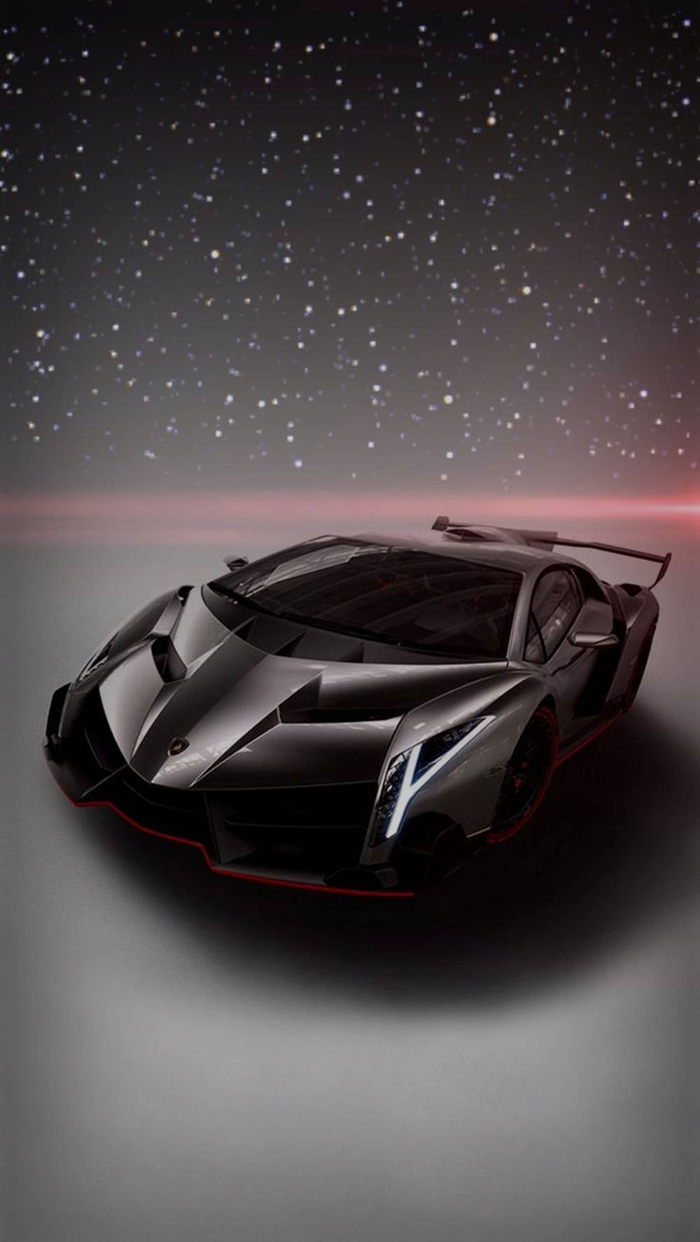 黑色動態圖 桌布 壁紙 — 一架型格黑色林寶堅尼 Veneno 在繁星點點的夜空下，襯托著泛紅的地平線。