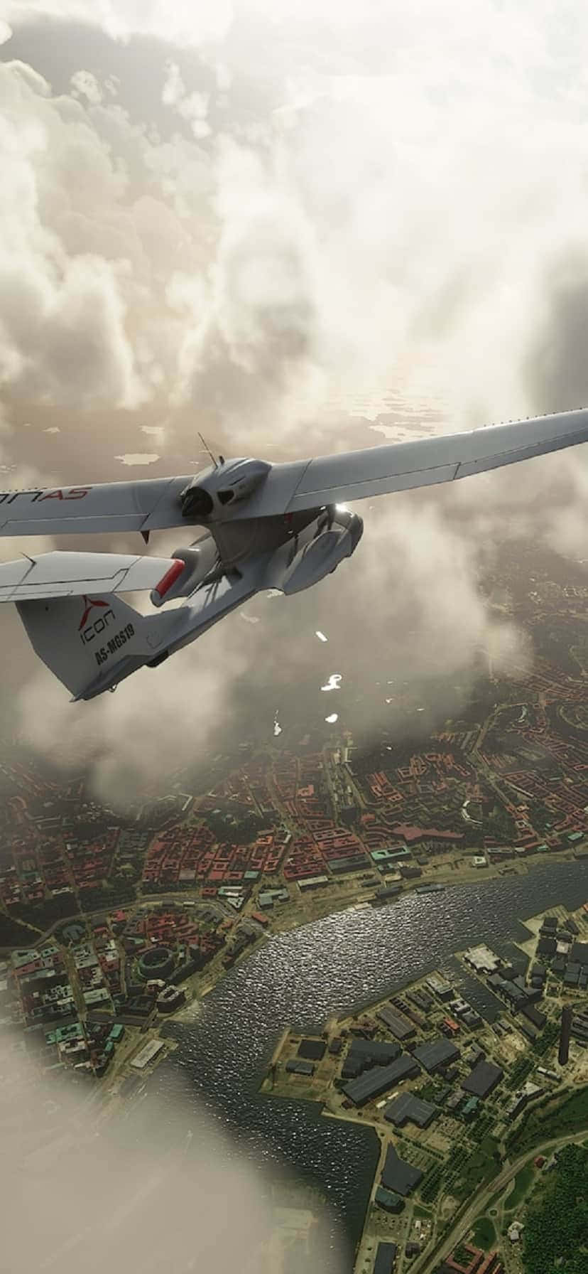一架小型飛機飛越城市上空 壁紙