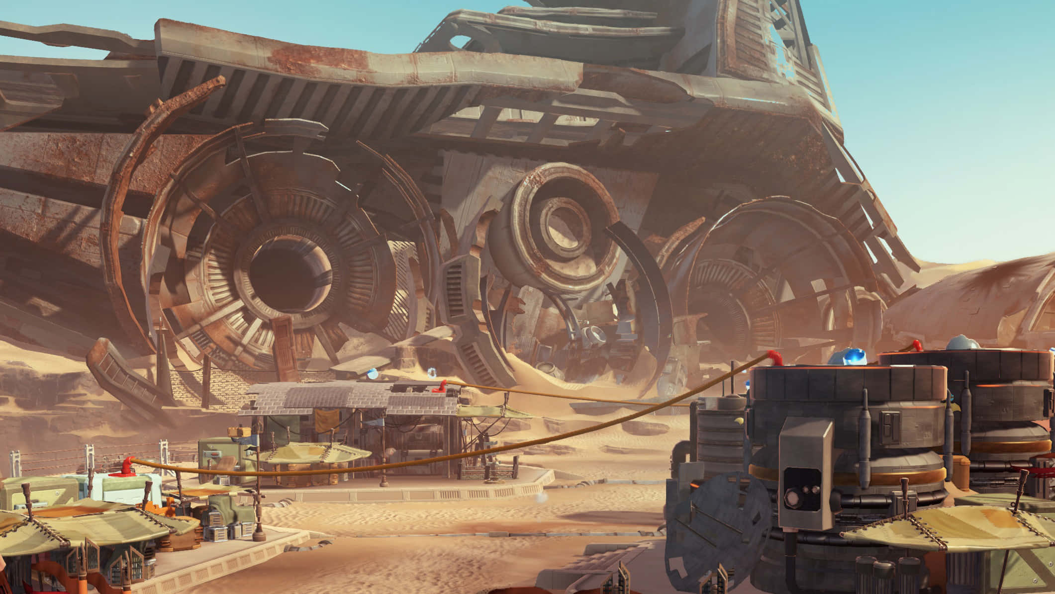 The Battle Of Jakku 桌布 壁紙 — 一架巨大生鏽的未來車輛停放在沙漠荒地中，附近有小聚落和機械。