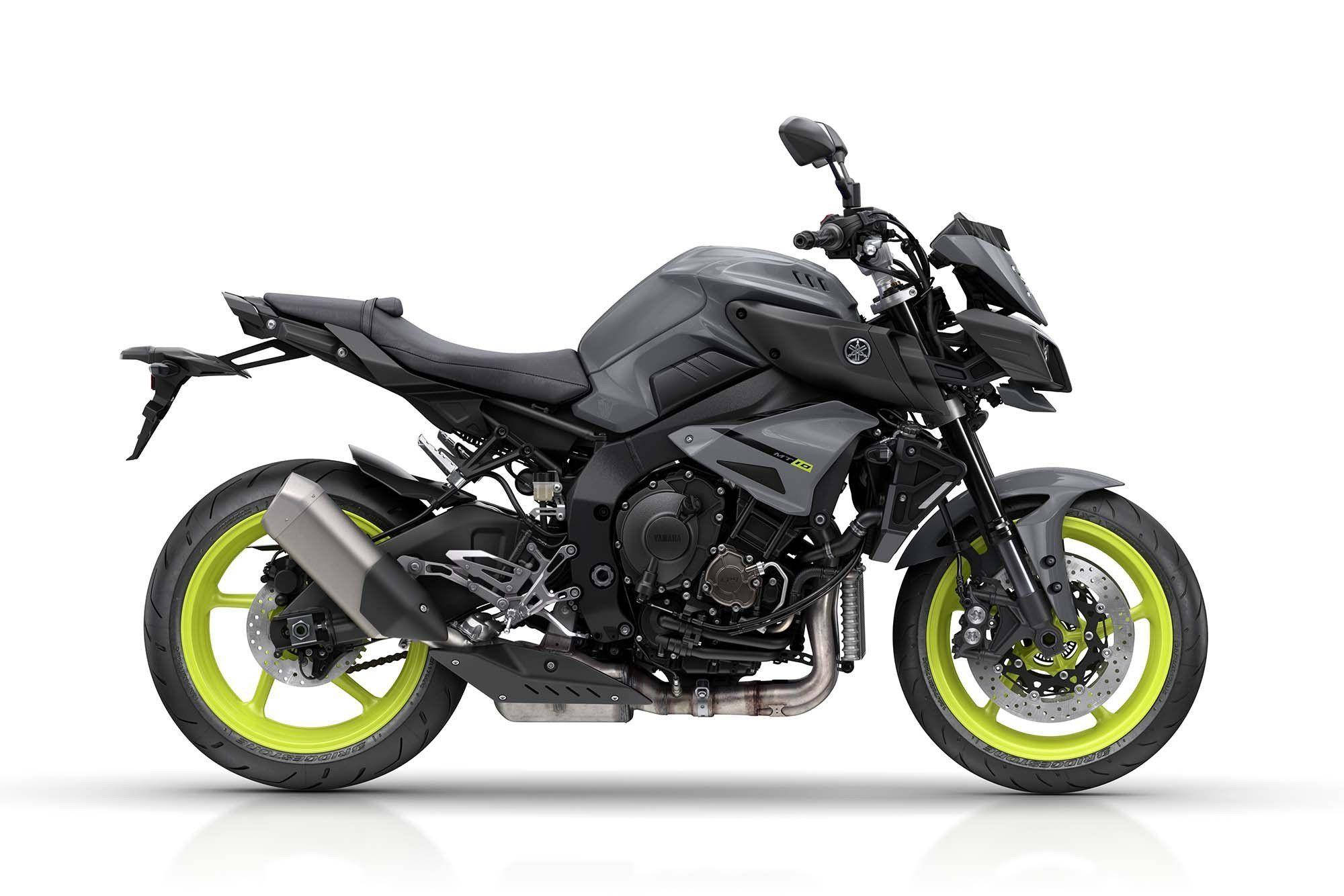 yamaha mt 15 桌布 壁紙 — 一架時尚的霧面黑色電單車，配以螢光黃色車輪，在純白色背景下的攝影棚燈光中展示。