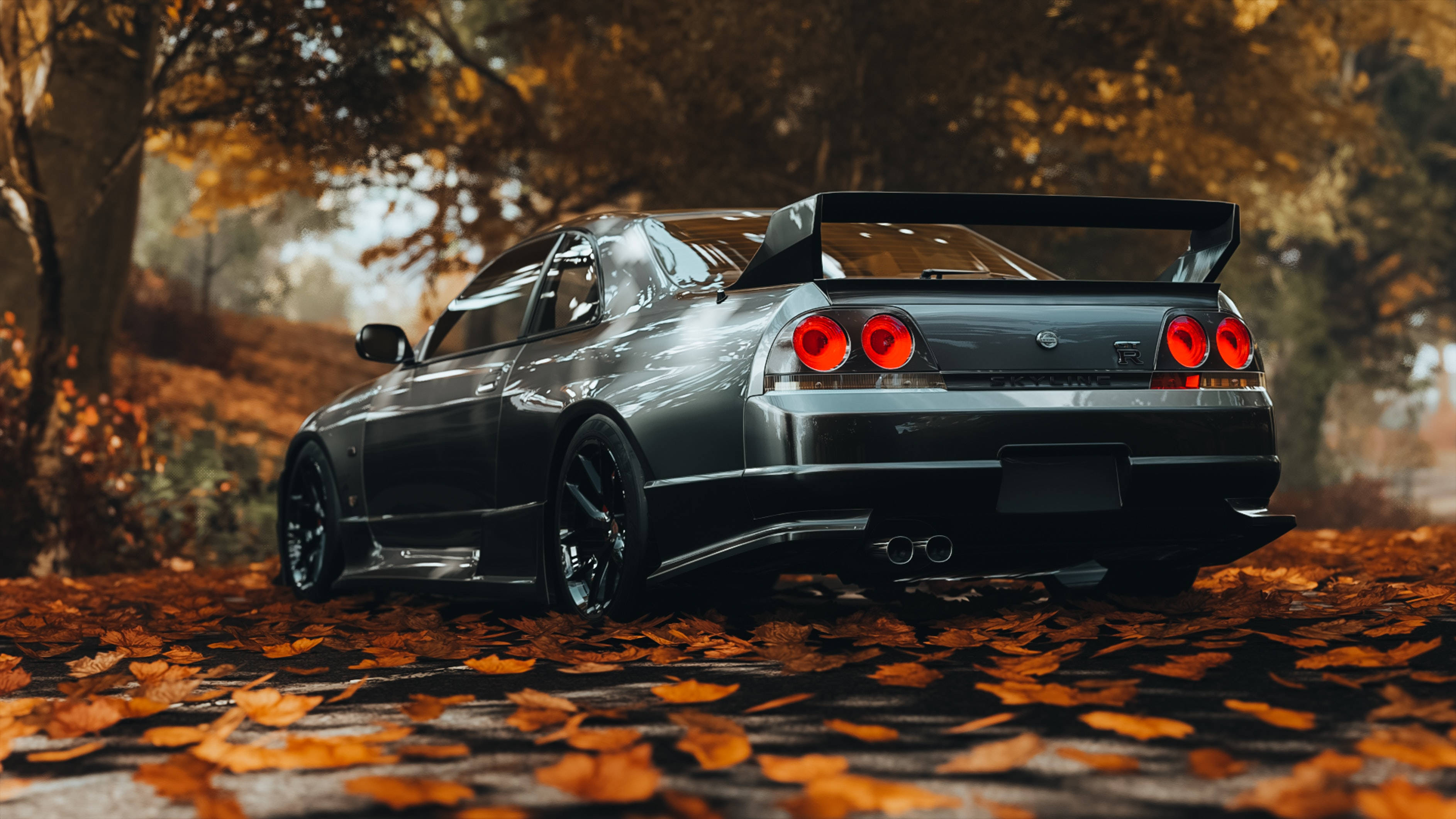 Nissan 桌布 壁紙 — 一架時尚黑色跑車，紅色尾燈閃爍，停泊在鋪滿金色秋葉的小徑上。