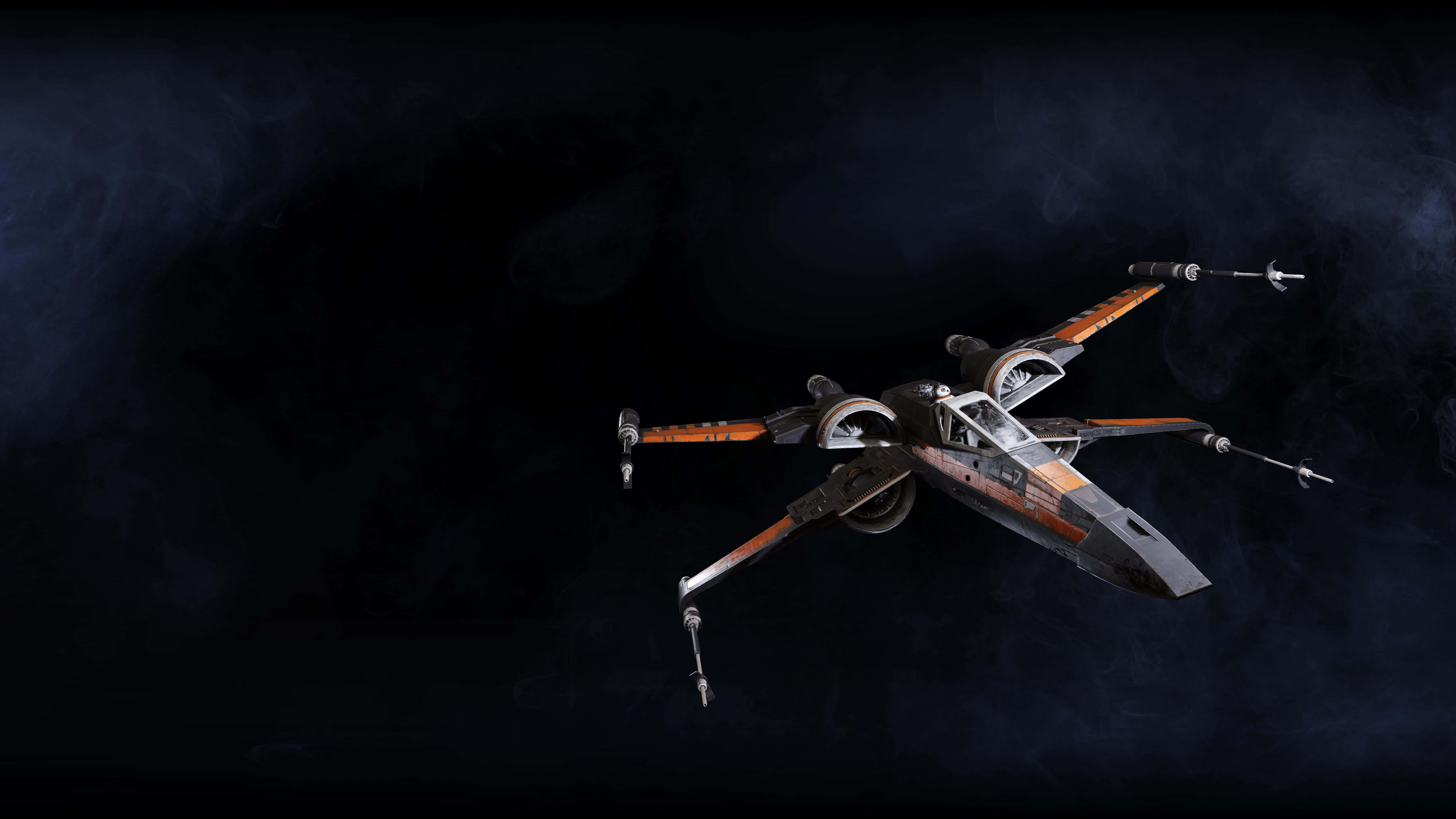 X-wing Fighter 桌布 壁紙 — 一架細節豐富的X翼星際戰鬥機在黑暗星雲中滑翔，周圍有旋轉的宇宙塵埃和微弱的星光。