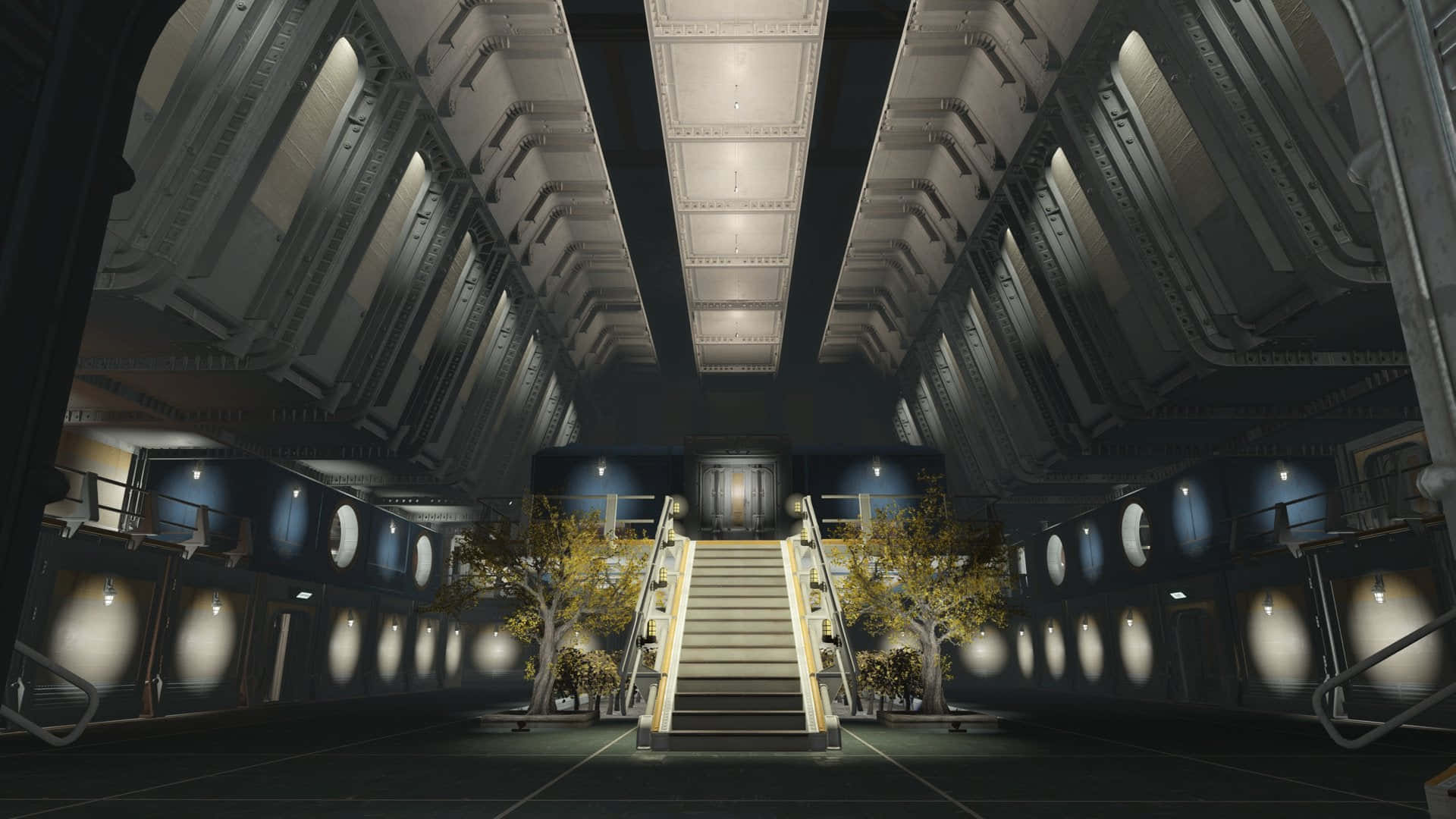 Fallout 4 Vault 桌布 壁紙 — 一條宏偉的工業樓梯穿過一個燈光昏暗、高天花的大廳，兩旁是發光的圓形窗戶和華麗的欄杆。