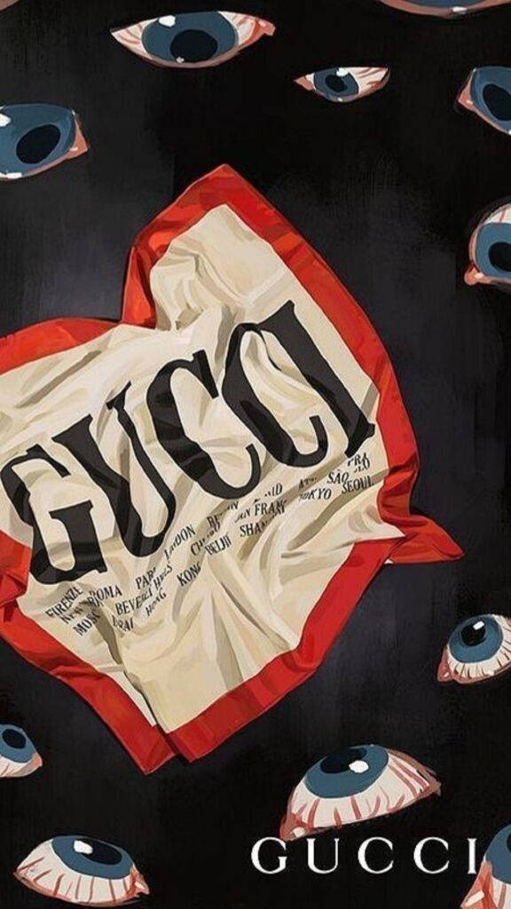 Gucci 桌布 壁紙 — 一條皺巴巴的Gucci圍巾，帶有粗體黑色字樣，在深色背景上漂浮的藍色眼睛之間飄浮。