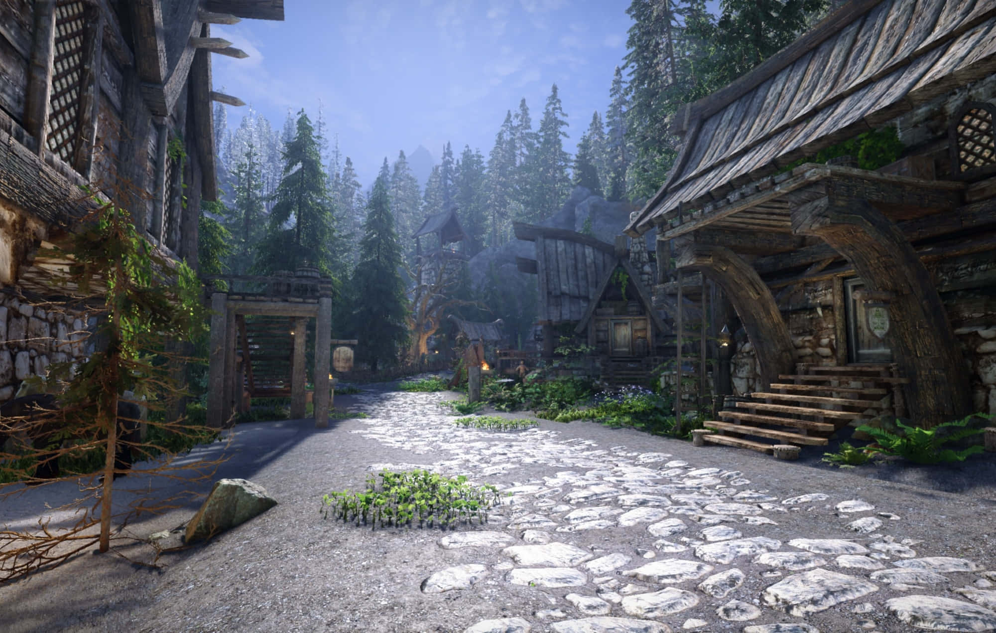Skyrim Falkreath 桌布 壁紙 — 一條鵝卵石小徑蜿蜒穿過一個坐落在茂密松林中的質樸木村，上方是明亮的藍天。