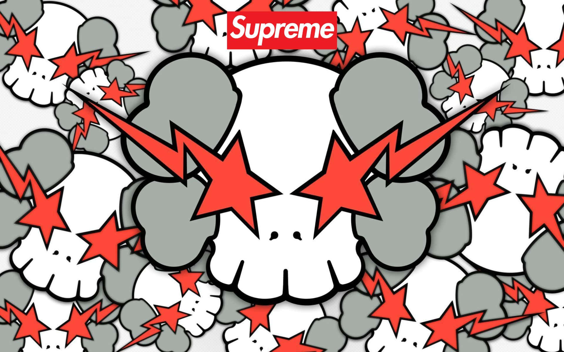 Kaws X Supreme 桌布 壁紙 — 一款大膽的圖案牆紙，中央有一個骷髏頭，周圍環繞著紅色星星和灰色煙霧雲，並帶有Supreme標誌。