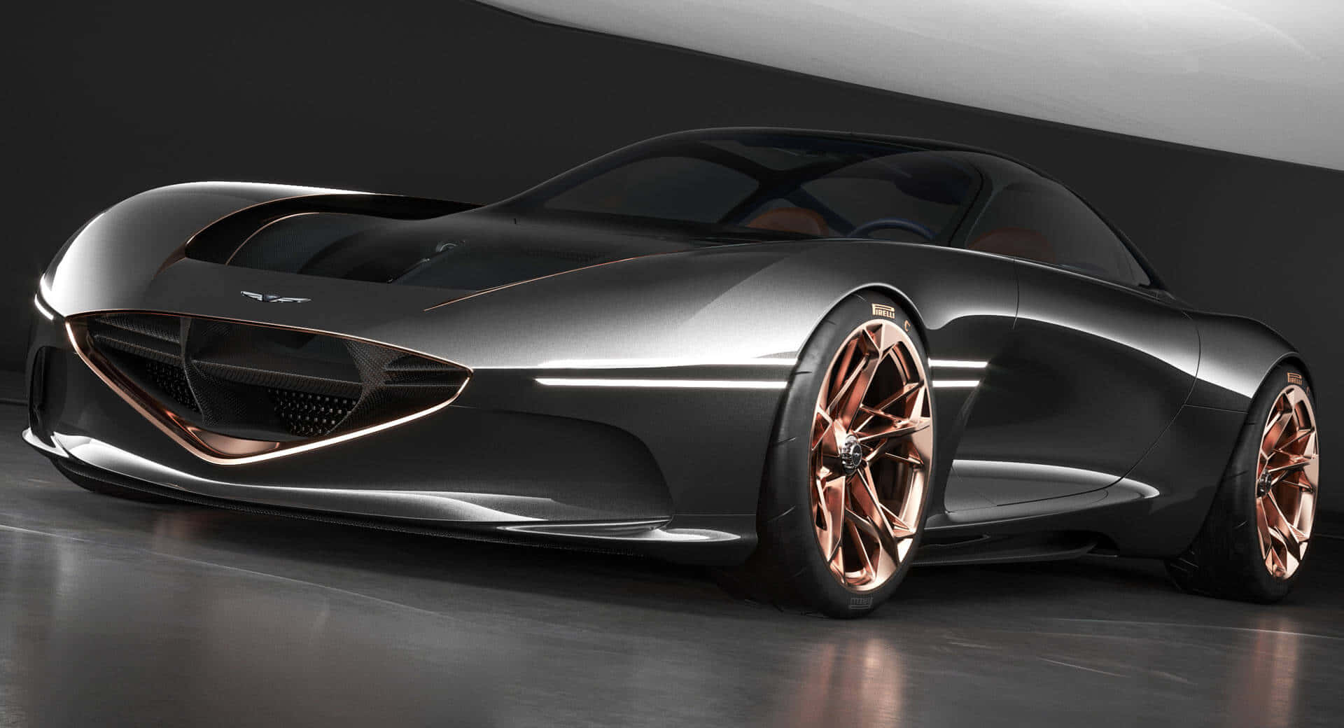 Genesis Essentia 桌布 壁紙 — 一款時尚未來感跑車，採用金屬灰車身和玫瑰金輪圈，在極簡工作室環境中展示。