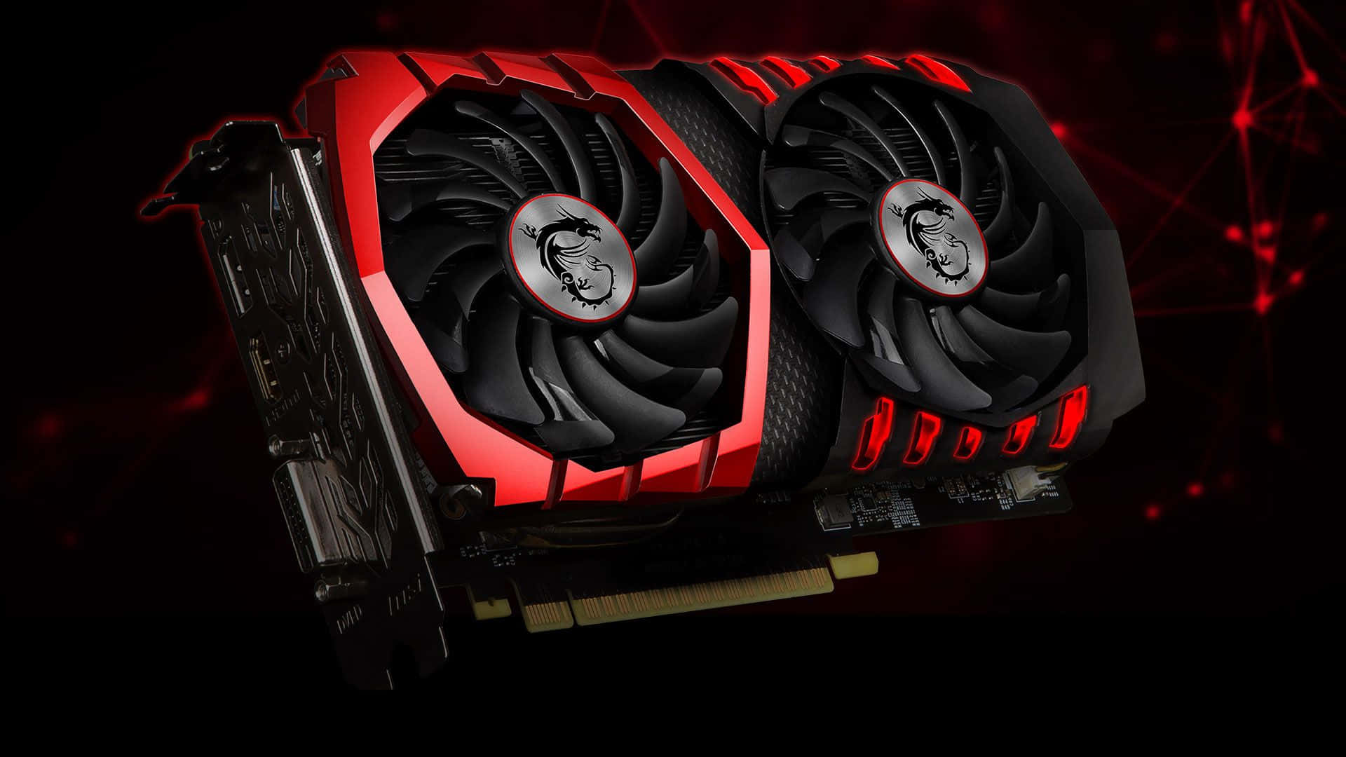 4K Graphics Cards 桌布 壁紙 — 一款時尚的紅黑 MSI 顯示卡，配備雙風扇和發光紅色點綴，背景為帶有紅色光效的深色背景。