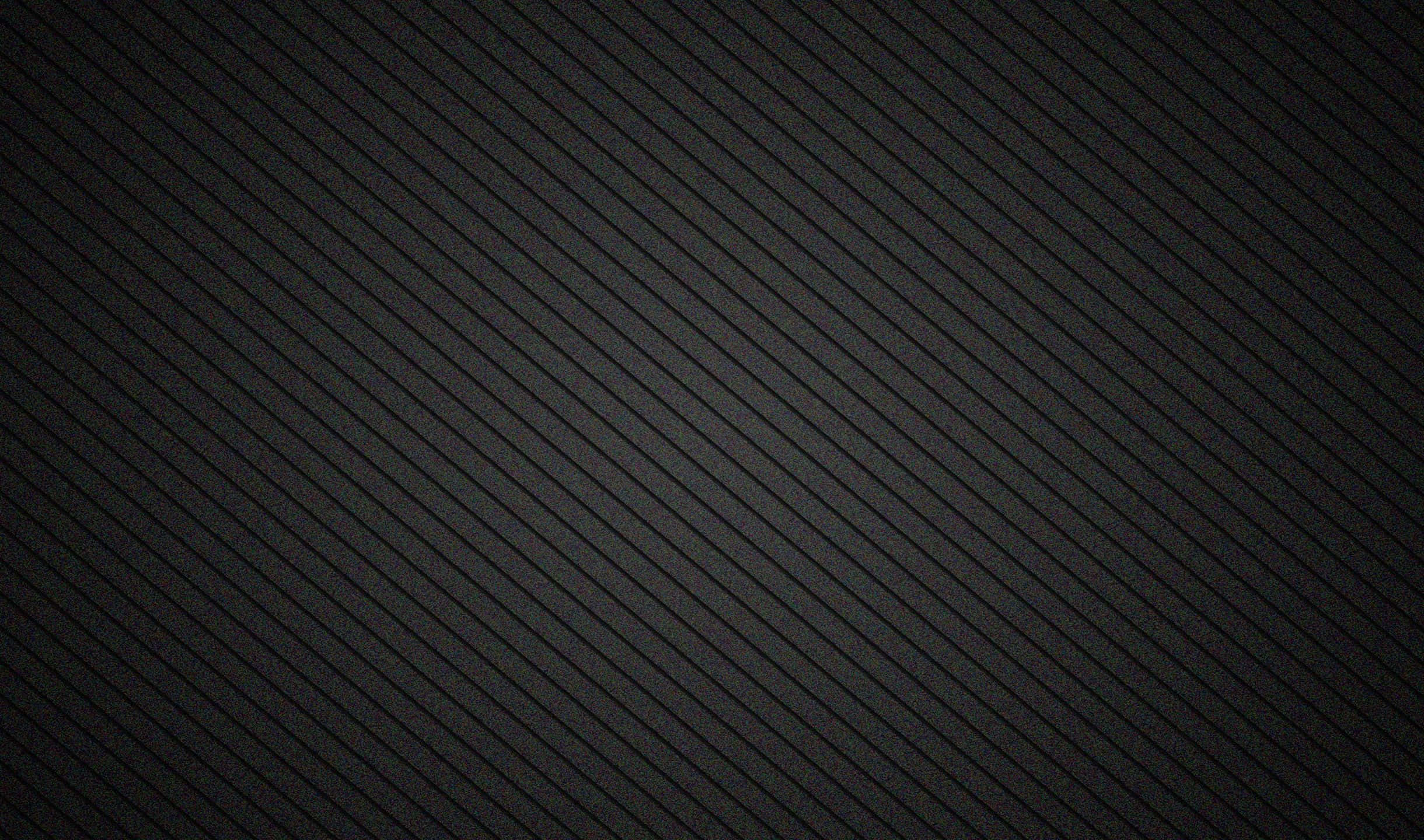 2440x1440 桌布 壁紙 — 一款極簡深灰色牆紙，帶有對角羅紋紋理，營造出時尚現代圖案。