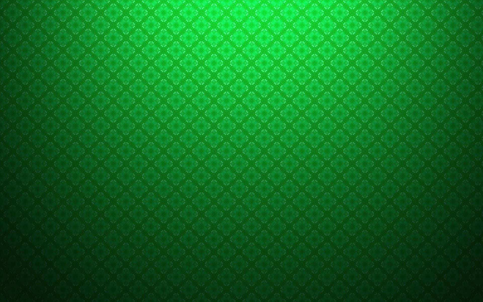 Green Texture 桌布 壁紙 — 一款漸變綠色牆紙，帶有重複的菱形花卉圖案，從明亮漸變至深色。