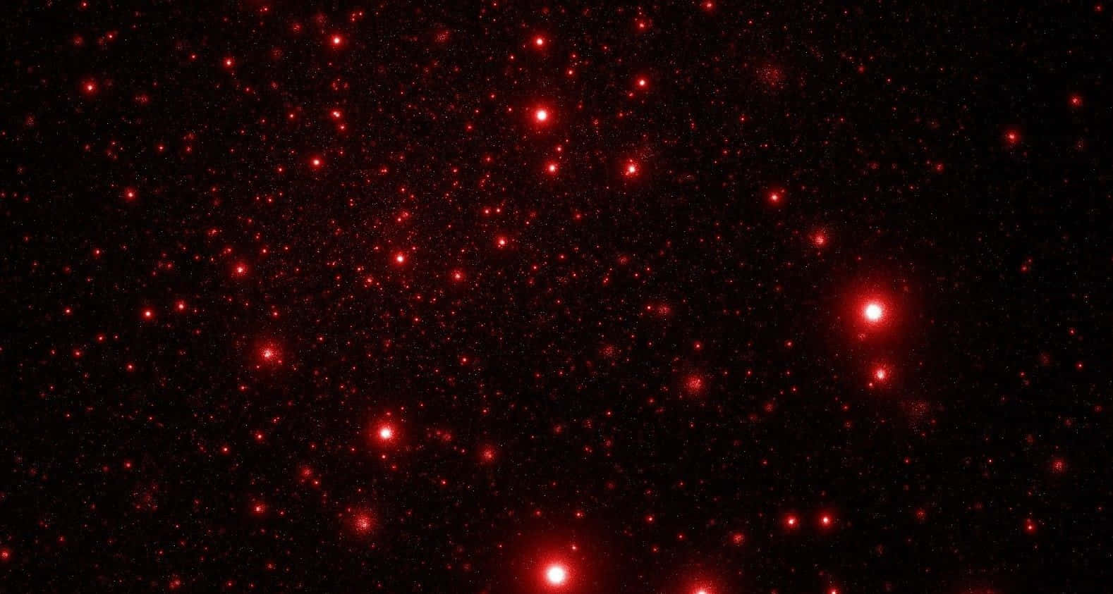 Red Space 桌布 壁紙 — 一片密集的發光紅星散落在深邃的黑色宇宙虛空中。
