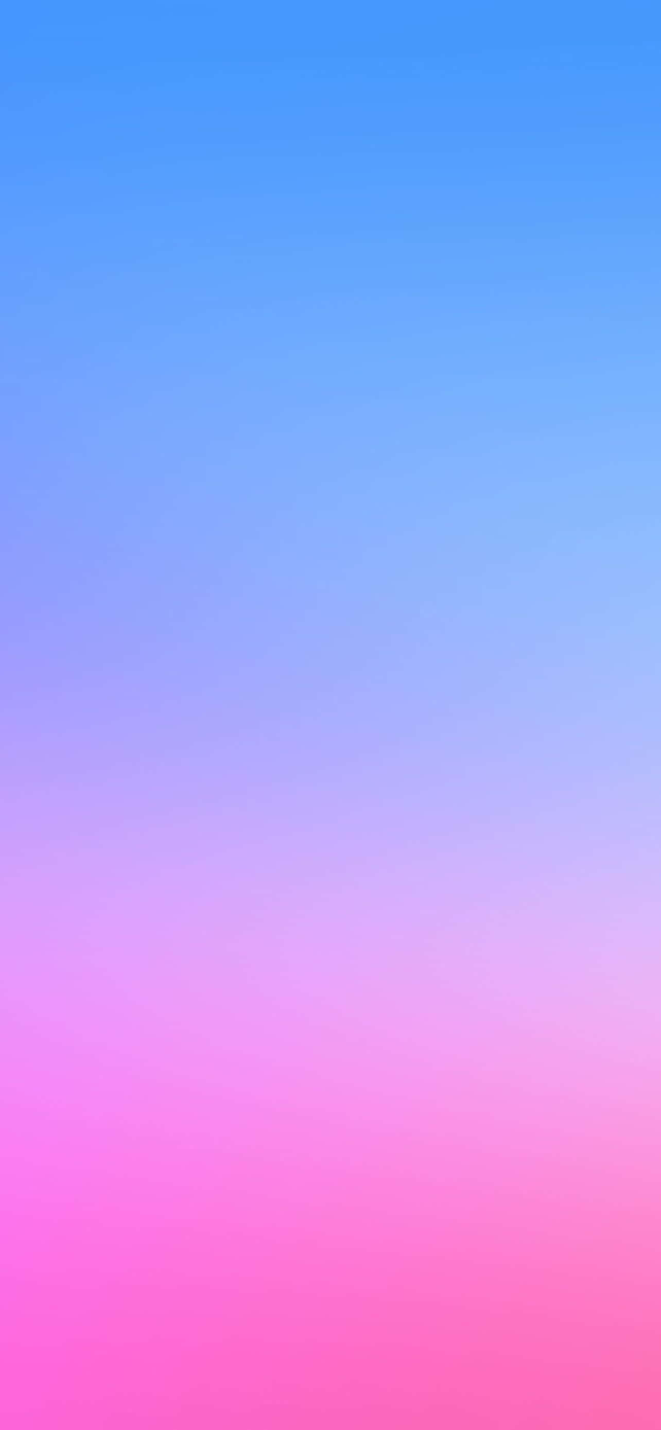 Blue iPhone 桌布 壁紙 — 一片寧靜的漸變天空，從柔和的藍色過渡到鮮豔的粉紅色和紫色色調。