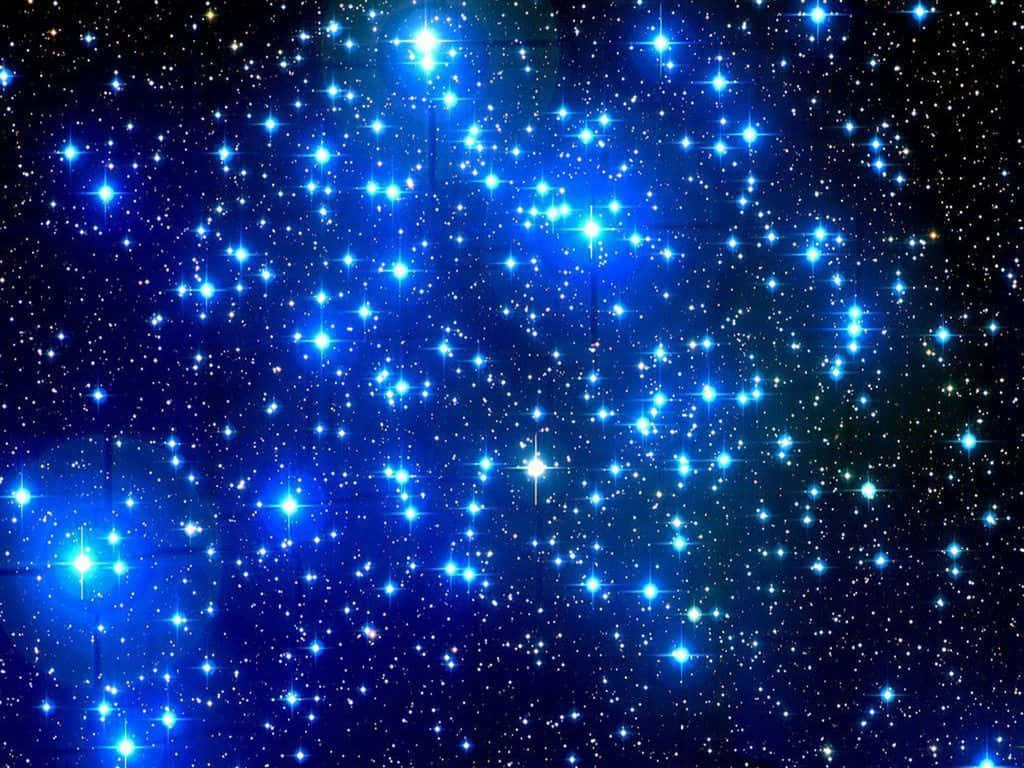 Beautiful Star 桌布 壁紙 — 一片耀眼嘅亮藍星星喺深邃宇宙黑色背景上閃爍。