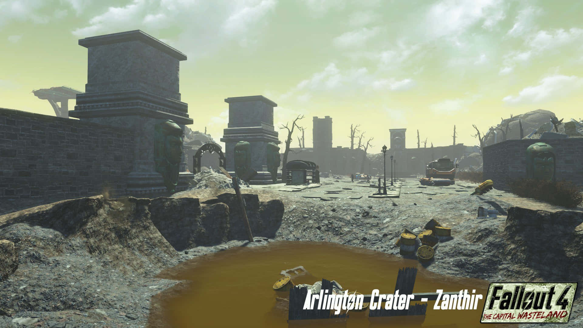 Fallout 4 The Capital Wasteland 桌布 壁紙 — 一片荒涼的末日後墓地，石製紀念碑 crumbling，生鏽的車輛，在朦朧的黃色天空下。