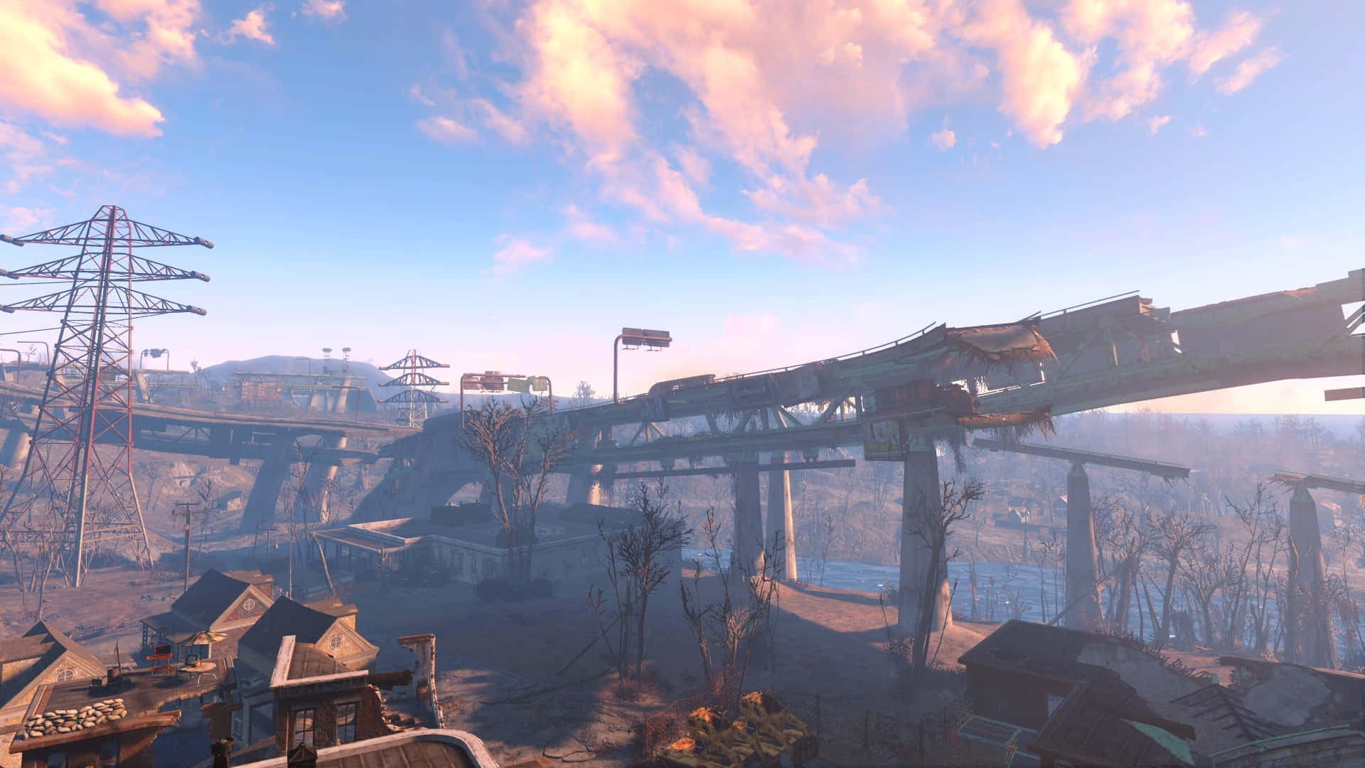 Fallout 4 Wasteland 桌布 壁紙 — 一片荒涼的末日後景觀，有破損的高架火車軌道和骨架般的樹木，在朦朧的粉紅色和藍色天空下。
