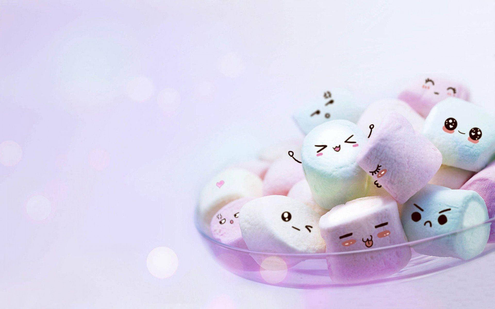 Marshmallow 桌布 壁紙 — 一碗粉彩色的棉花糖，帶有可愛卡通臉孔，在夢幻薰衣草背景上柔和發光。