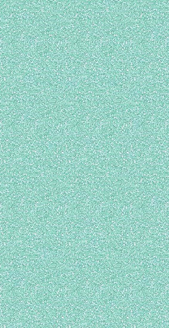 Seafoam Green 桌布 壁紙 — 一種舒緩的薄荷綠色背景，帶有微妙的白色斑點，營造出柔軟紋理的牆紙。