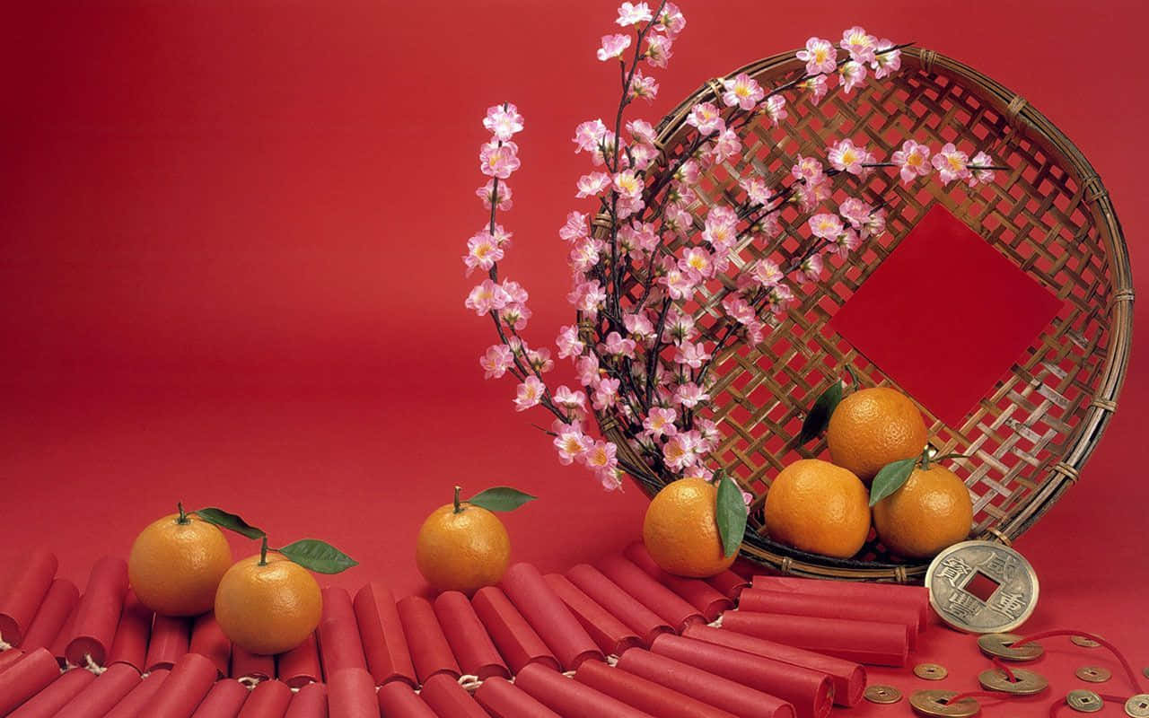 一籃橙子與紅色背景 壁紙