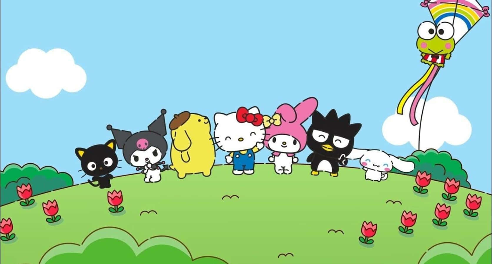 Hello Kitty And Friends 桌布 壁紙 — 一群Sanrio角色站在長滿青草的山丘上，周圍有紅色鬱金香，藍天白雲，上空有彩虹風箏飛翔。
