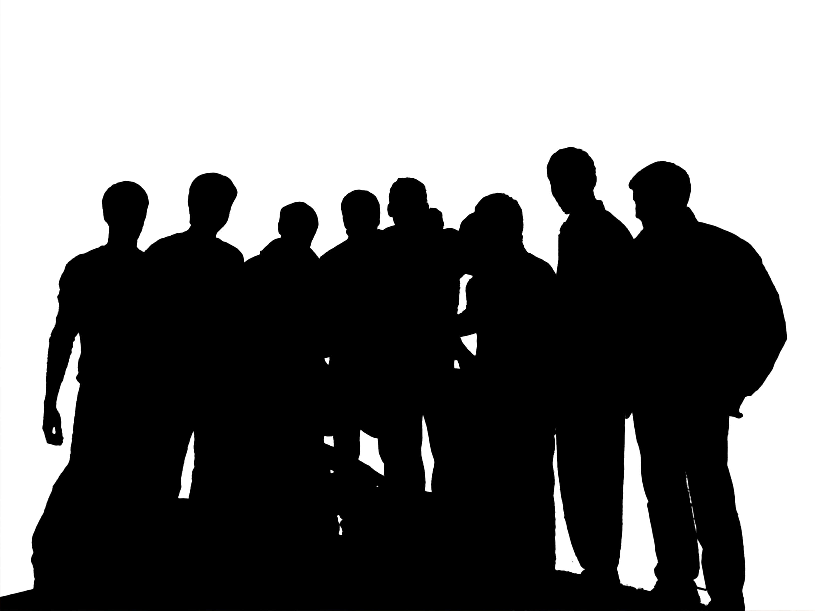 People 桌布 壁紙 — 一群人以黑色剪影形式出現在純白背景上，緊密地站在一起形成人群。