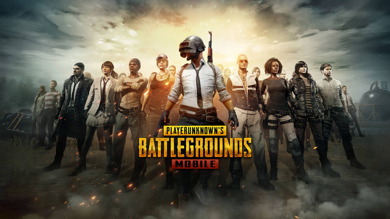 Playerunknown's Battlegrounds 桌布 壁紙 — 一群多元化的battle royale玩家身穿戰術裝備，在煙霧瀰漫的田野上，在戲劇性的日落天空下挑釁地站立。
