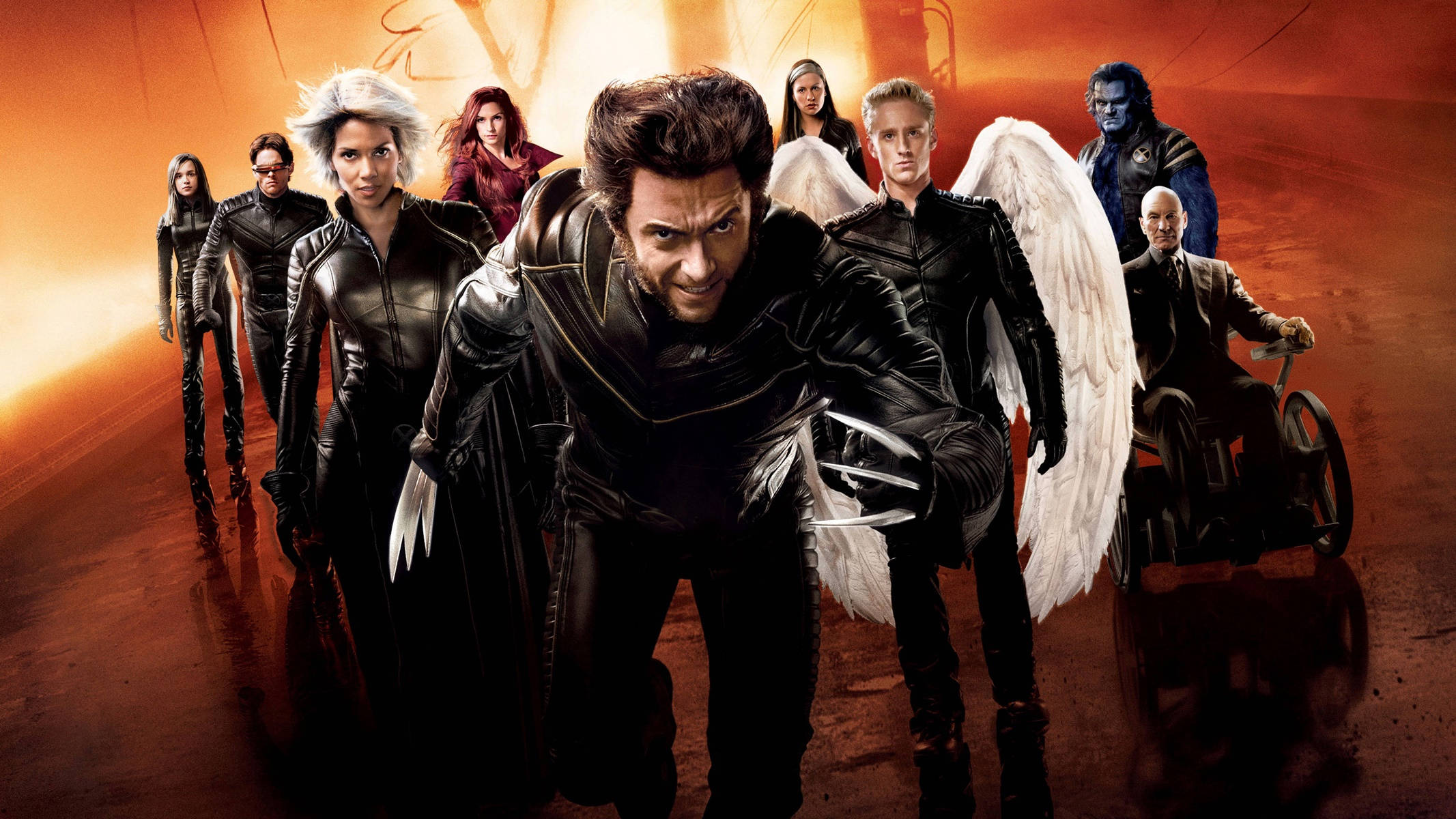 X Men Movie The Last Stand 壁紙 — 一群身穿黑色皮革裝備的X-Men超級英雄，在熾熱的橙色背景下準備戰鬥。
